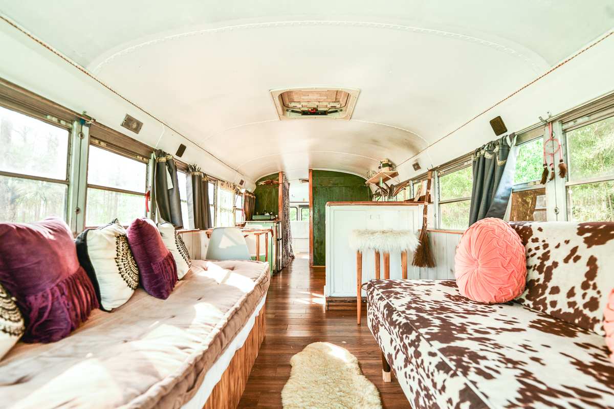 The bus interior is uniquely decorated