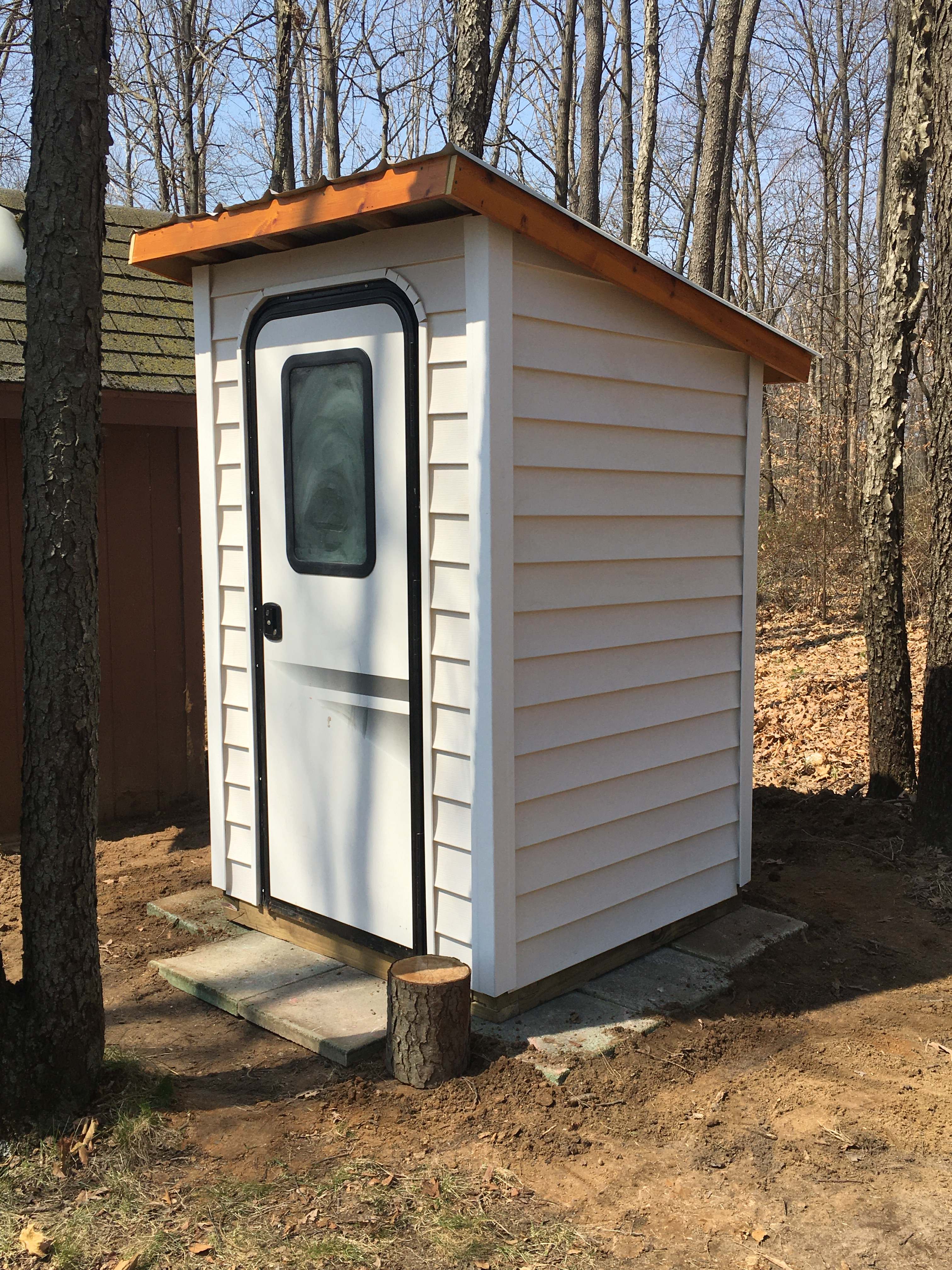 Thanks to the help of my husband! The whole is dug and the new outhouse is installed. Now all I have to do is paint it