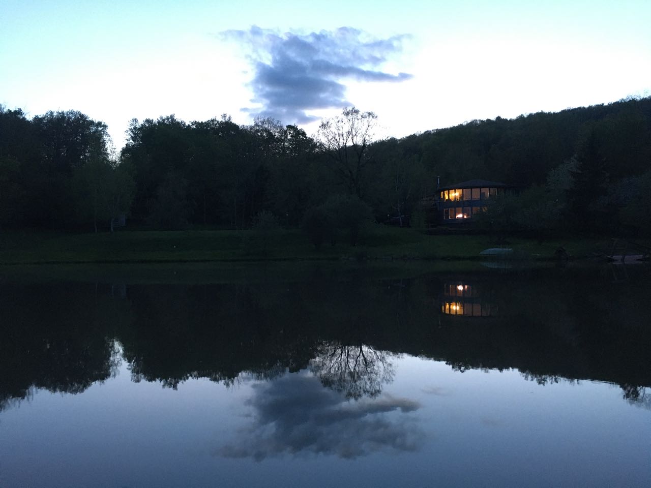 View of the house from camping side of the pond, so you can get a sense of distance. When leaves are all filled in, it's even more private. The actual camp sites are tucked further down the hill from here and not visible at all.