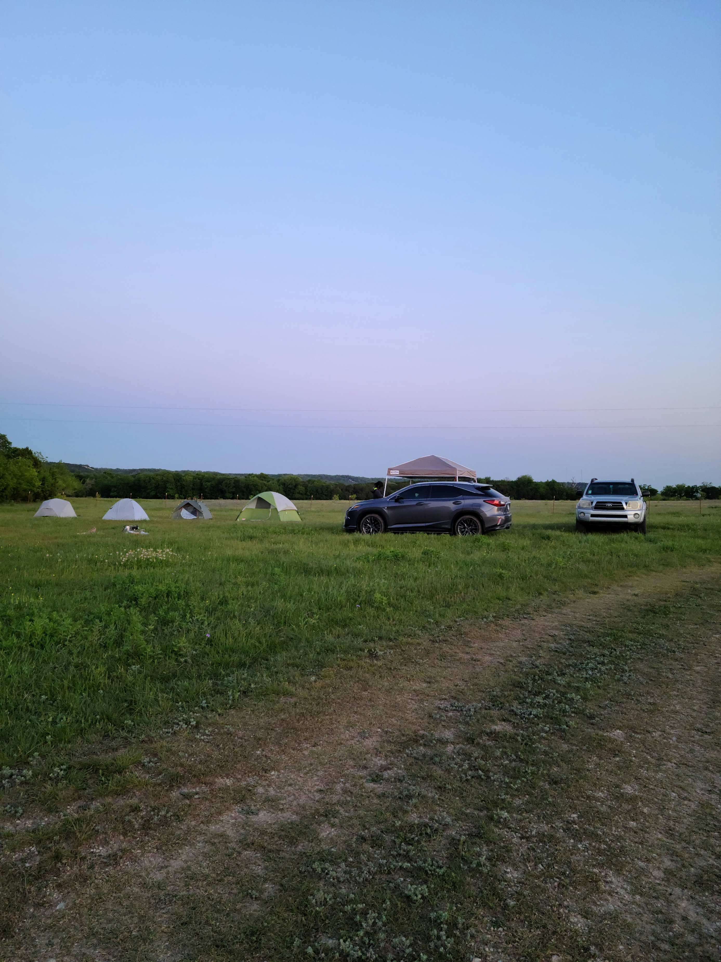 Set up near the farm road on the high ground above a small creek.