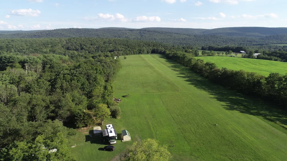 Showing 45' RV on site with multiple slide outs.