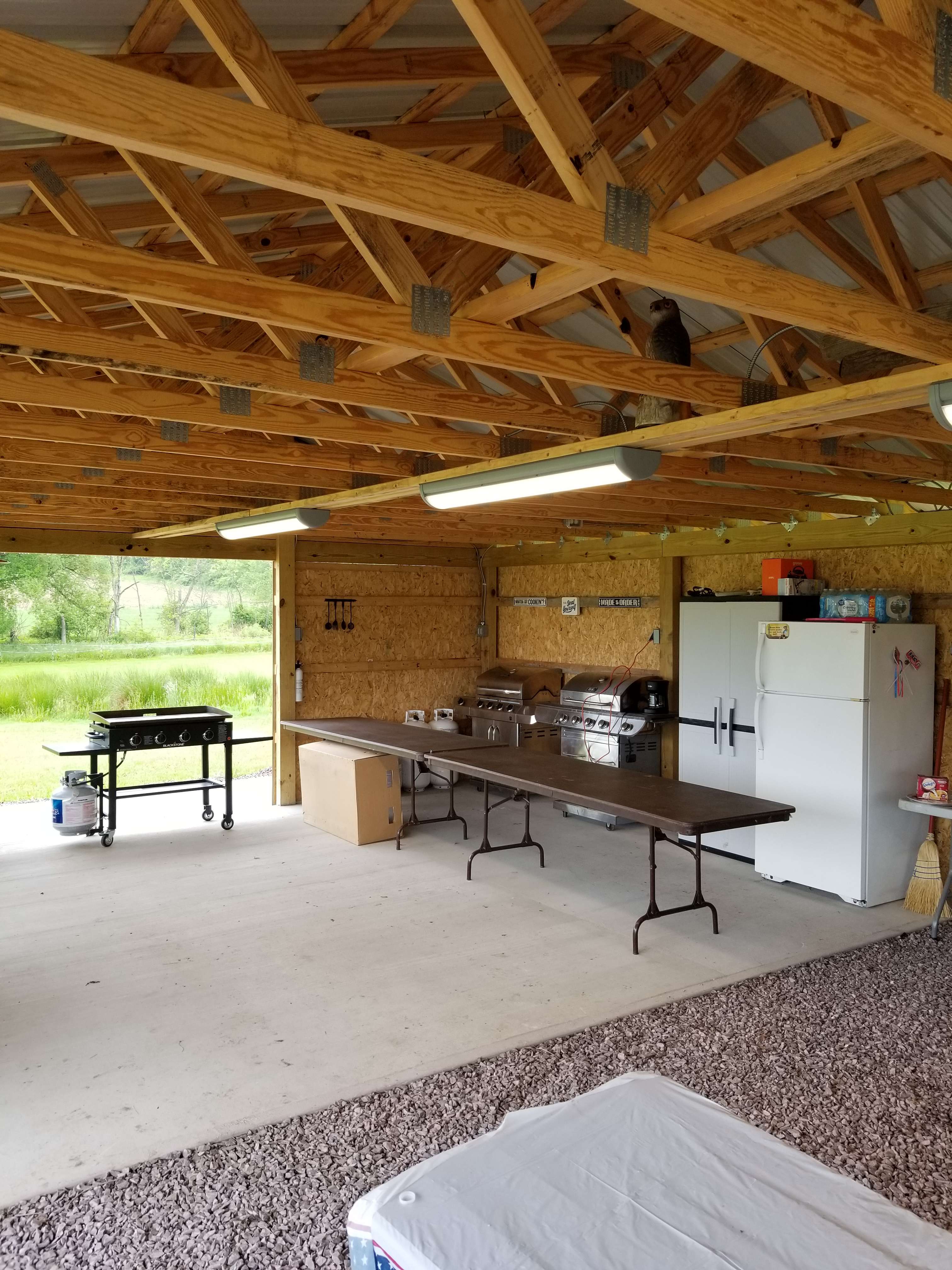 2 propane grills, flat top propane griddle, communal refrigerator
