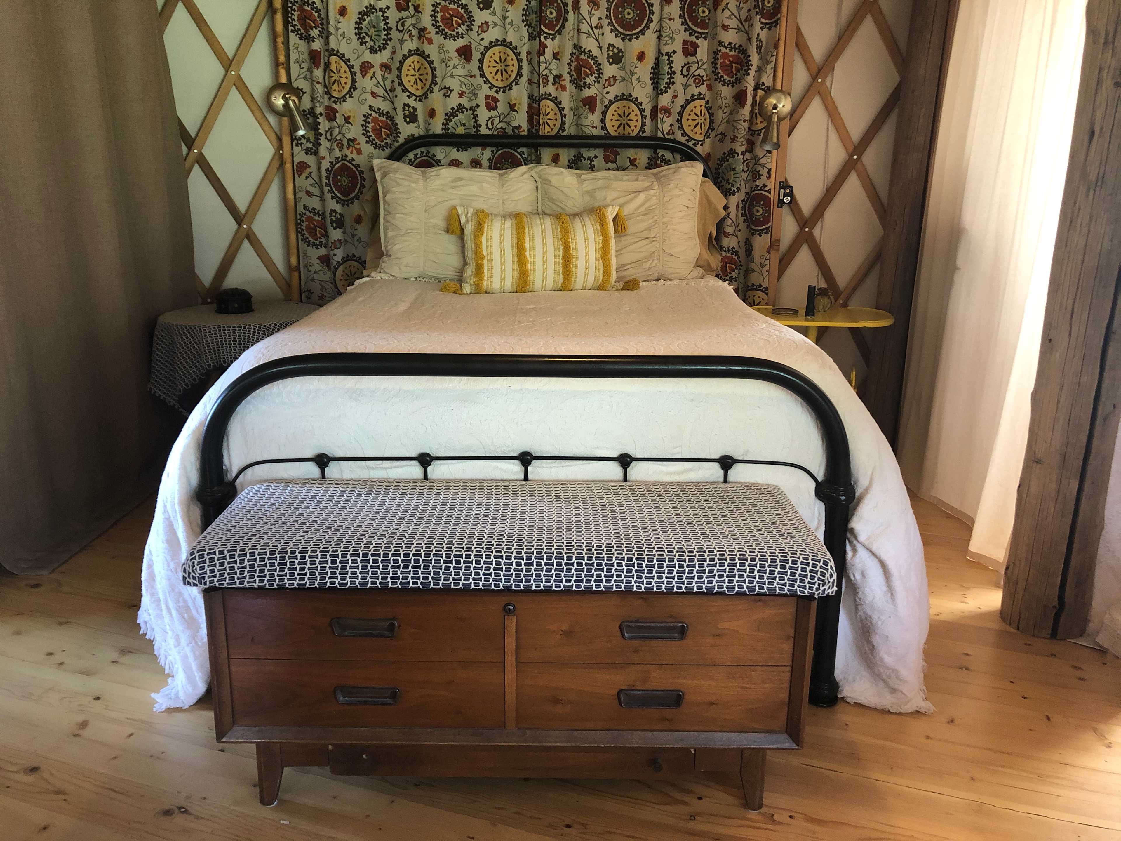 Main bedroom has privacy curtains which can be closed around the room.
8” gel foam mattress and comfy linens on an antique full size bed. Sleeps 2