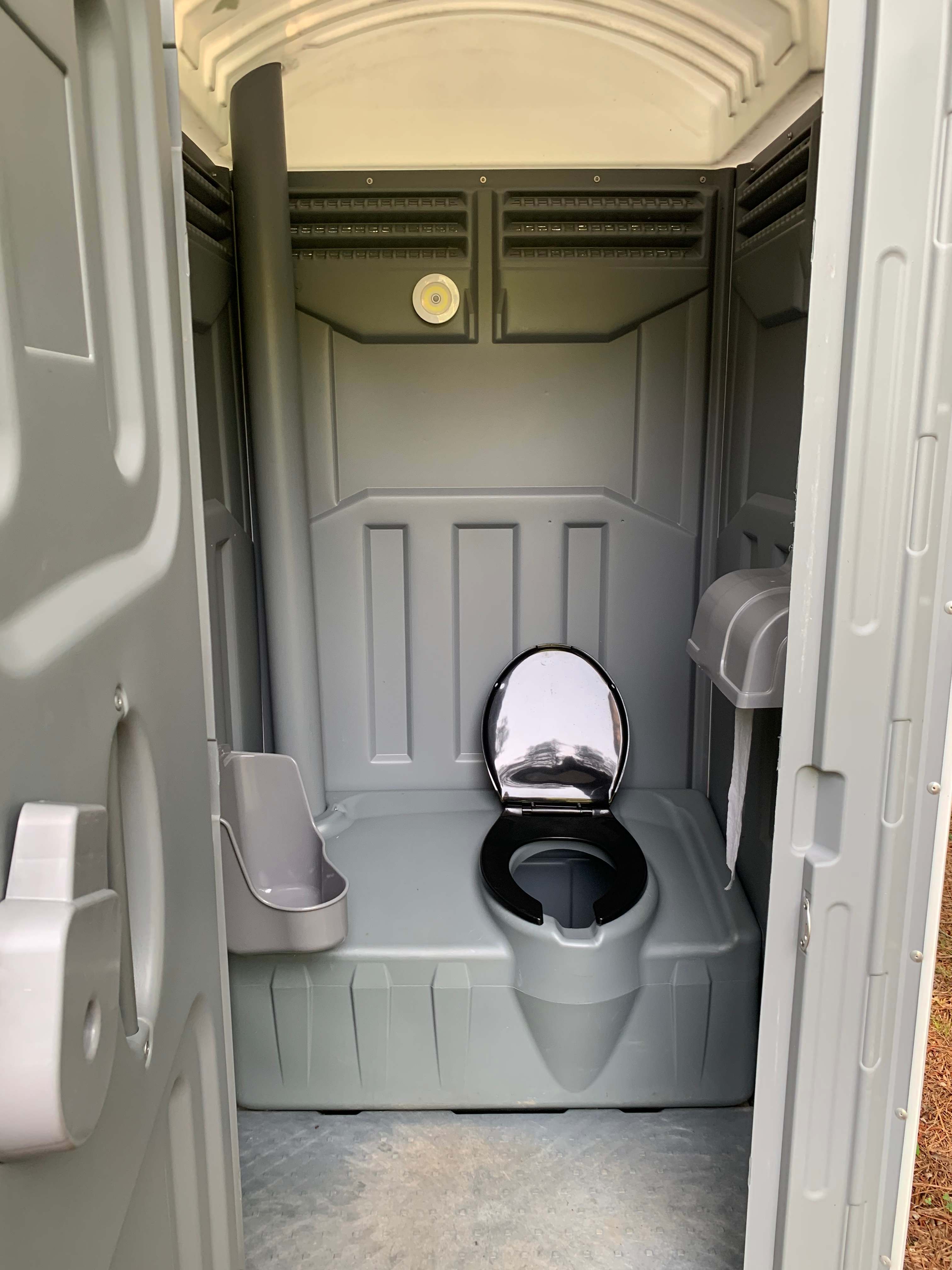 Porta toilet onsite. Sanitized prior to each checkin. Professionally pumped and cleaned weekly. It even has a motion sensor light and boy is it bright!