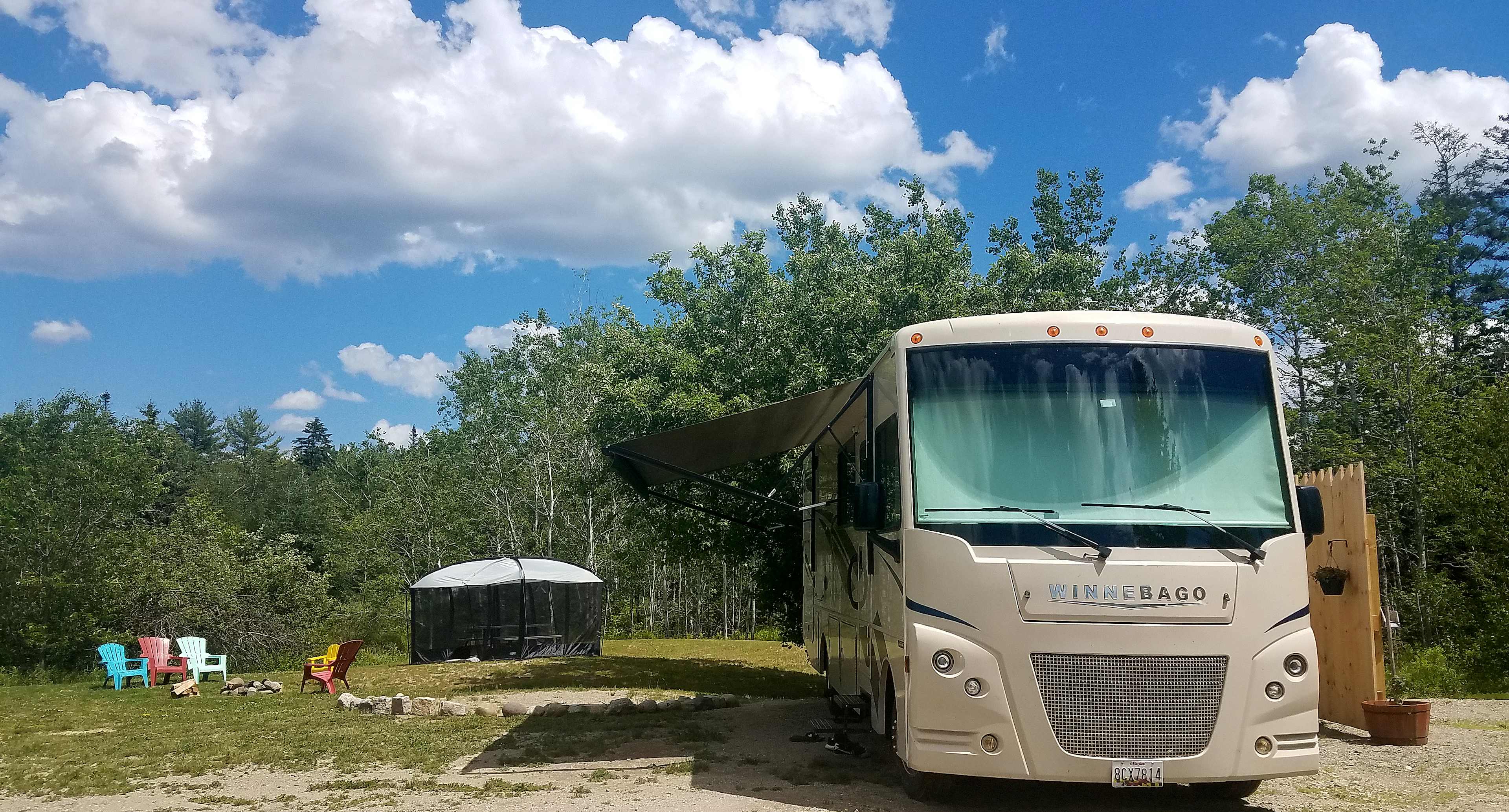A 40 foot coach on the pad, feel free to bring and set up your own screen house!