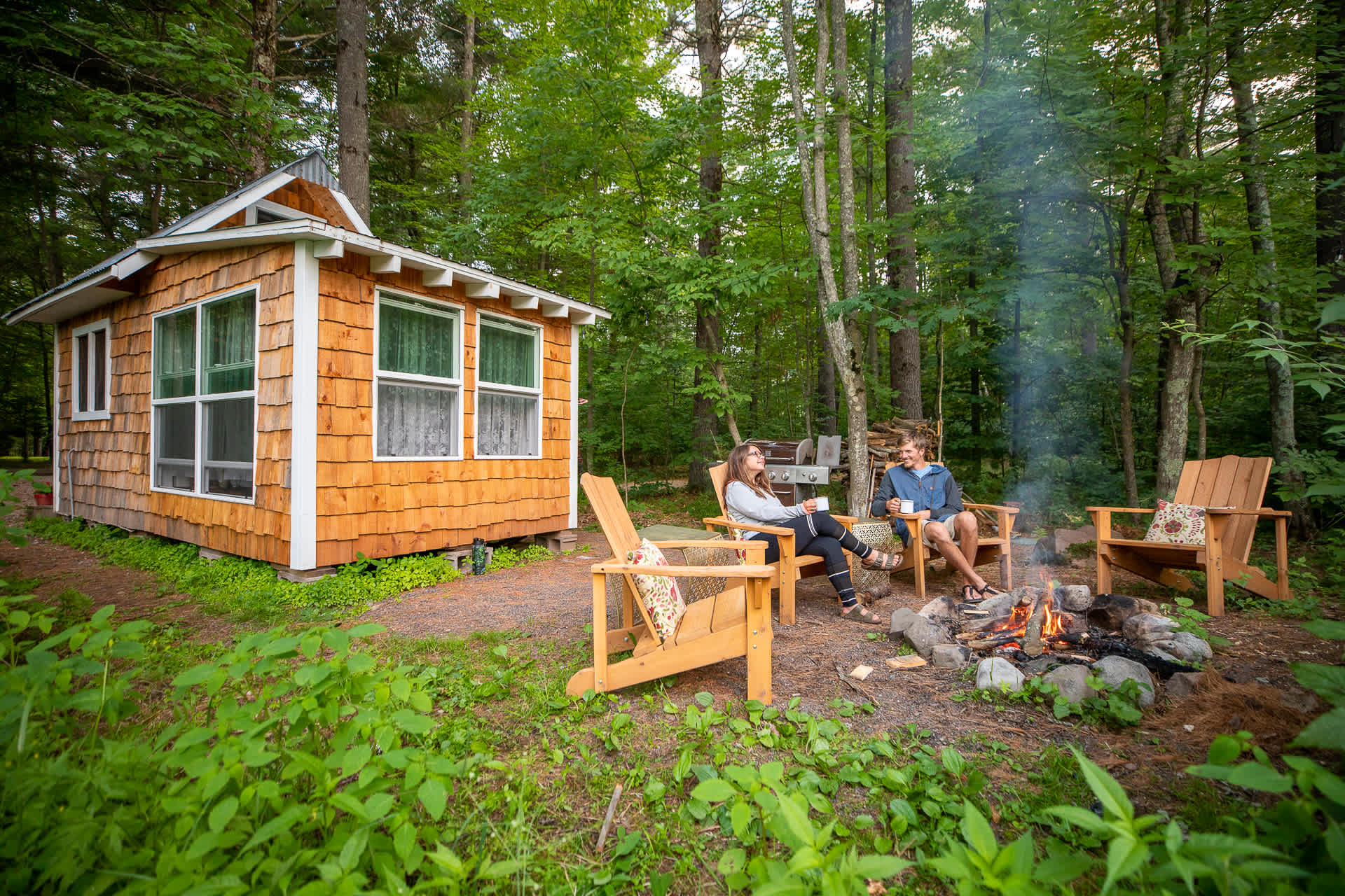 Campfire area in the back located next to one of the smaller ponds
