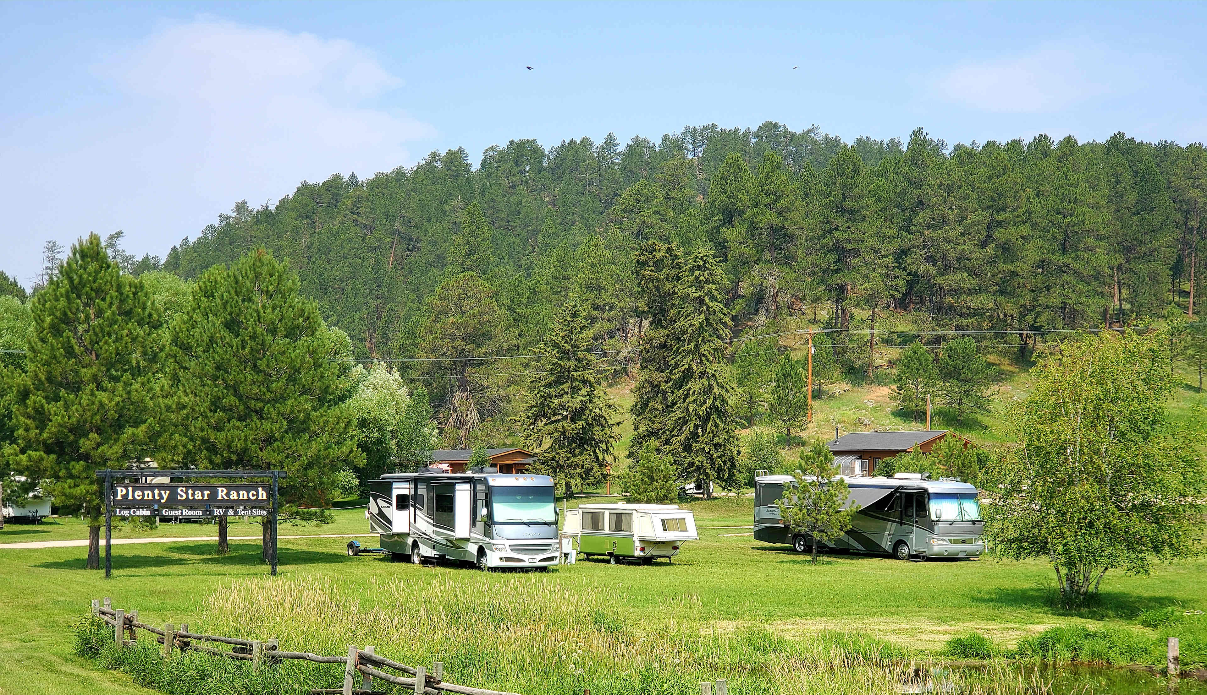 Partial RV sites, 50 - 30 - 50 amp, drive through, dump station just on the other side of the little driveway.