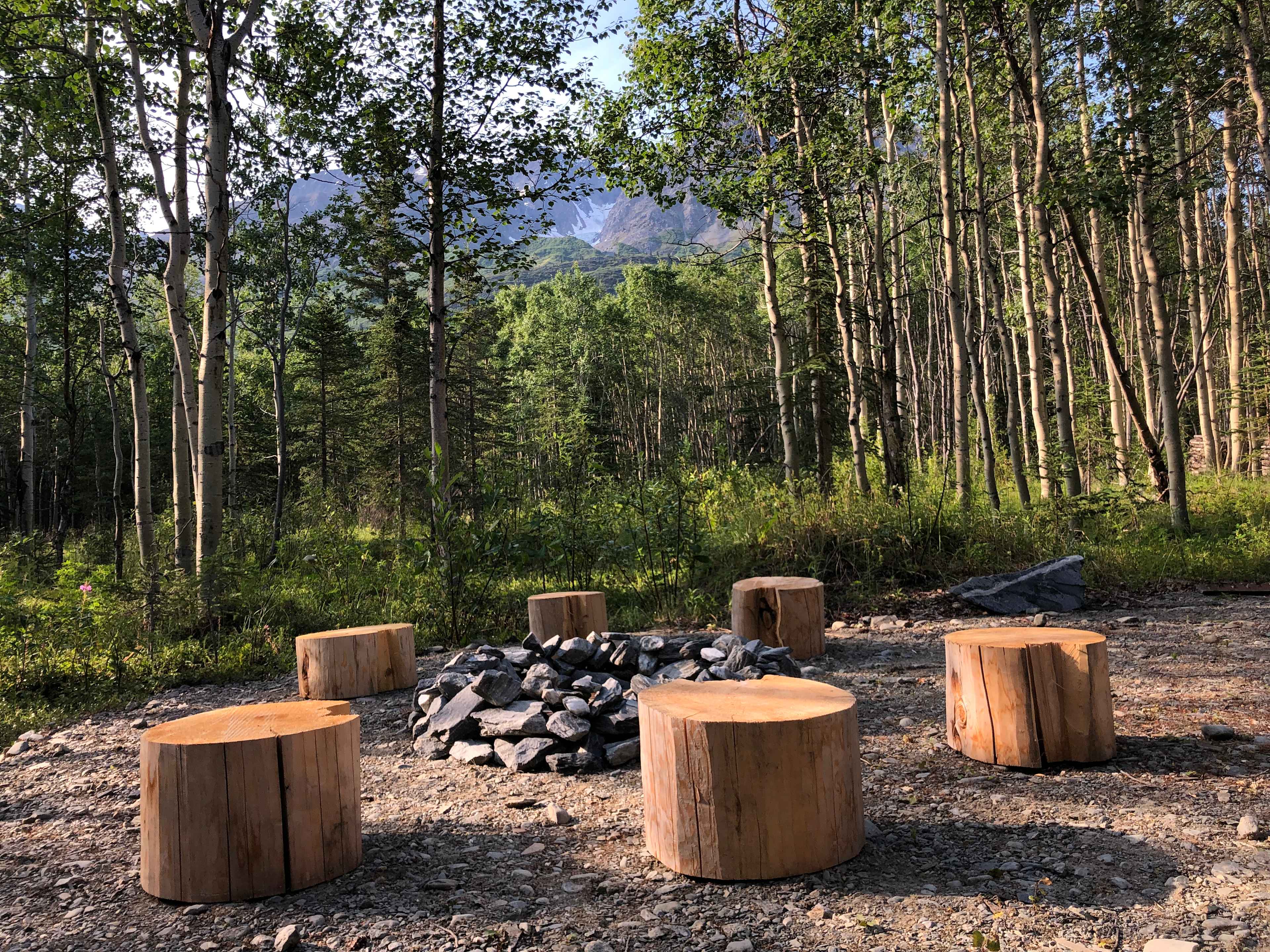 Fires are not allowed any time at this campsite during dry day/night time conditions. (Even outside of regional "Fire Ban" periods... no exceptions.)  Please call to verify if and when fires are permitted. If a fire is to be enjoyed during a period where the ground and vegetation is damp/wet, a provided and filled water pale must be present next to the fire ring. The fire must be completely doused with water and the embers completely expired of heat after use. There are no local wildfirefire services in the region. Thanks for your understanding!