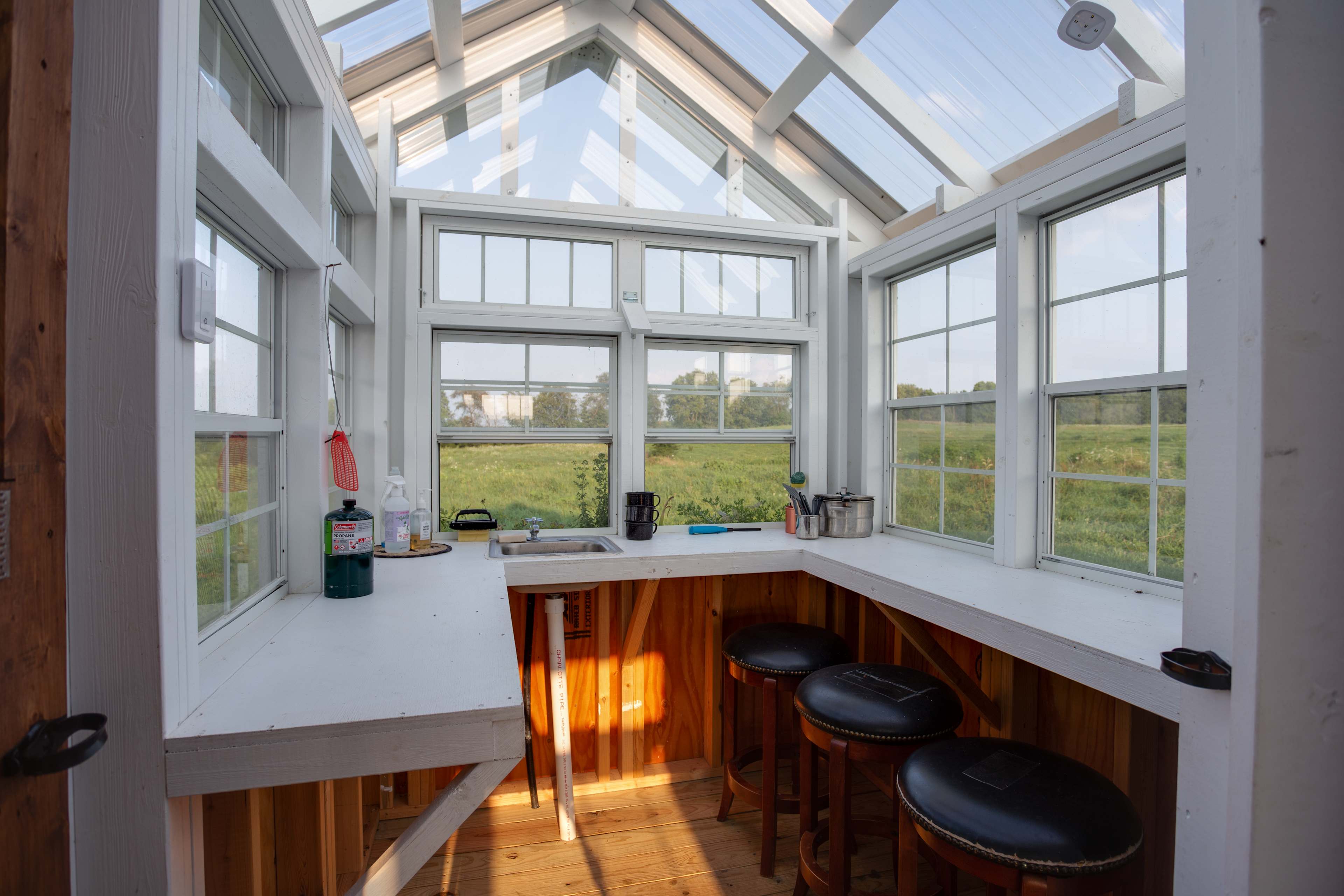 The kitchen area has great windows and skylights