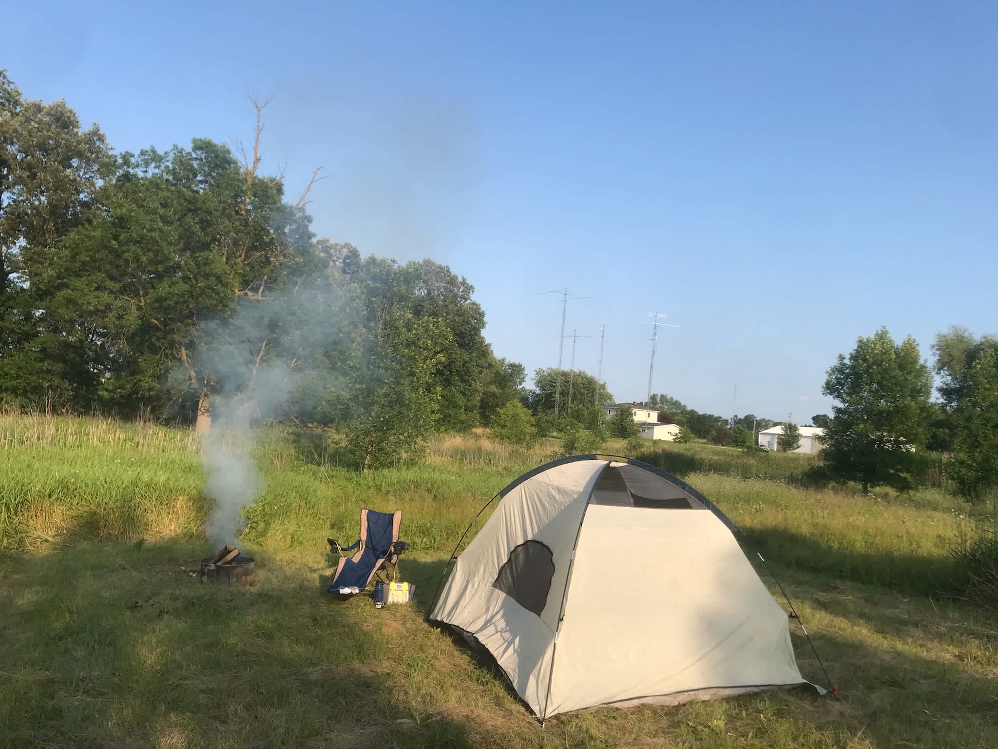 One of our guests all ready for a peaceful evening. Tent and other items NOT included. Our home is in the background.