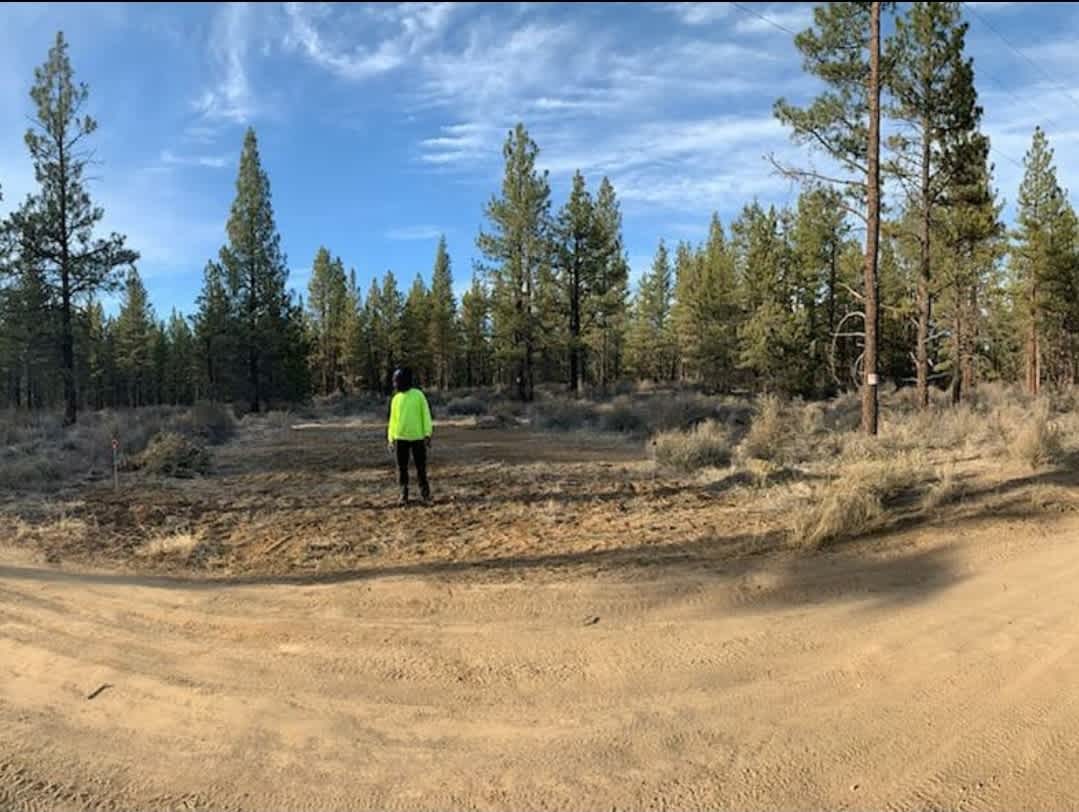Cleared space to park RV or trailers. Can pull in directly from Peacepipe lane. 