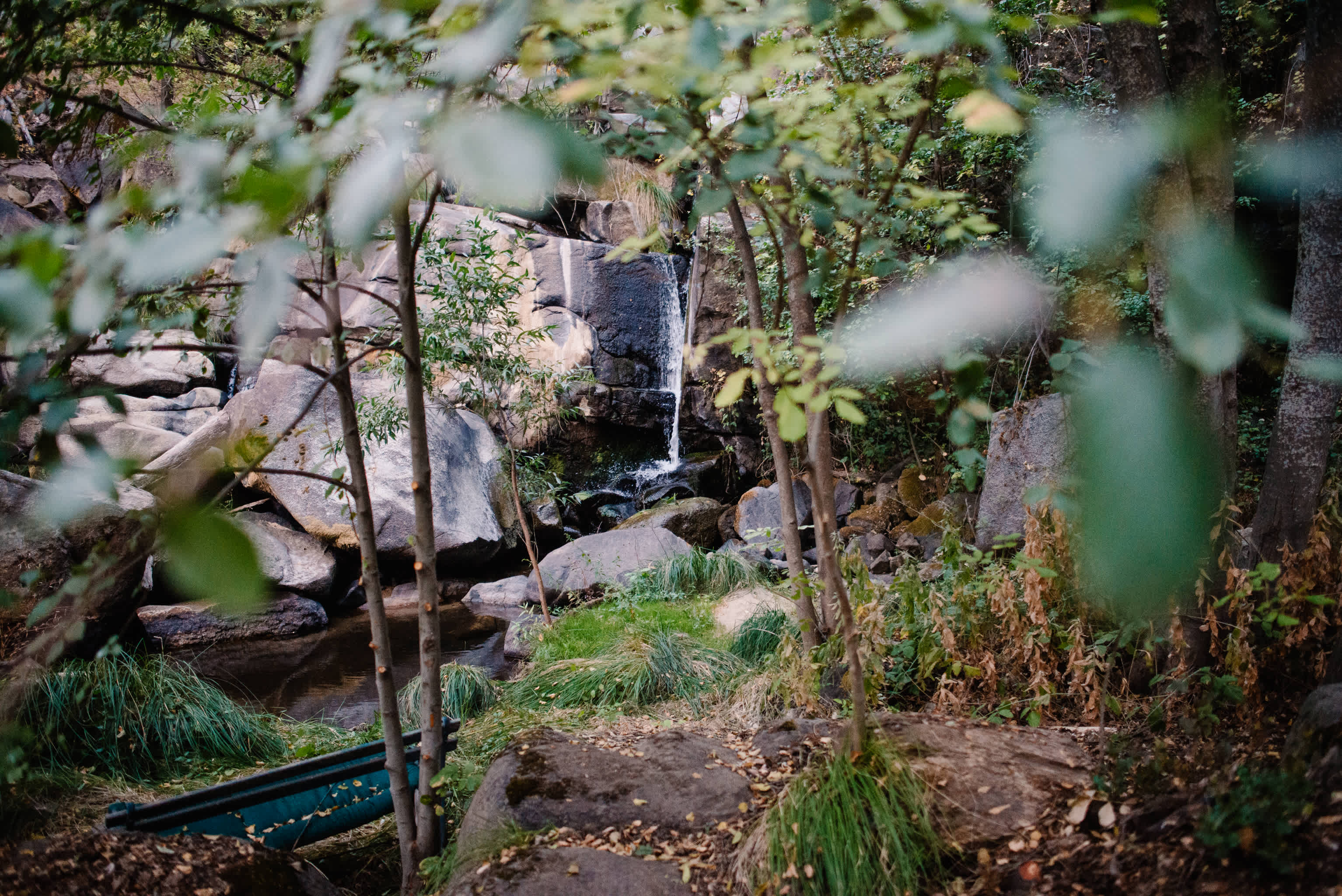 One of the falls with a bench