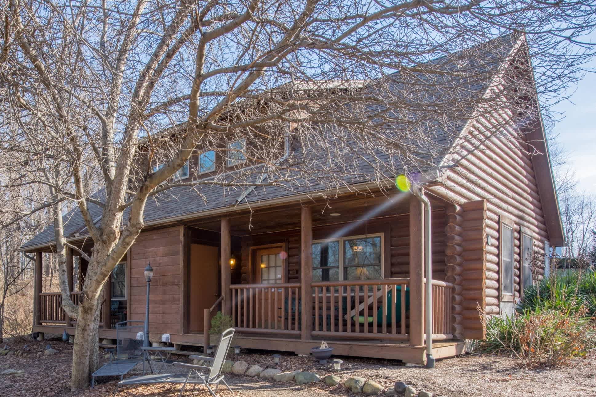 Harmony Suite front porch with porch swing.
