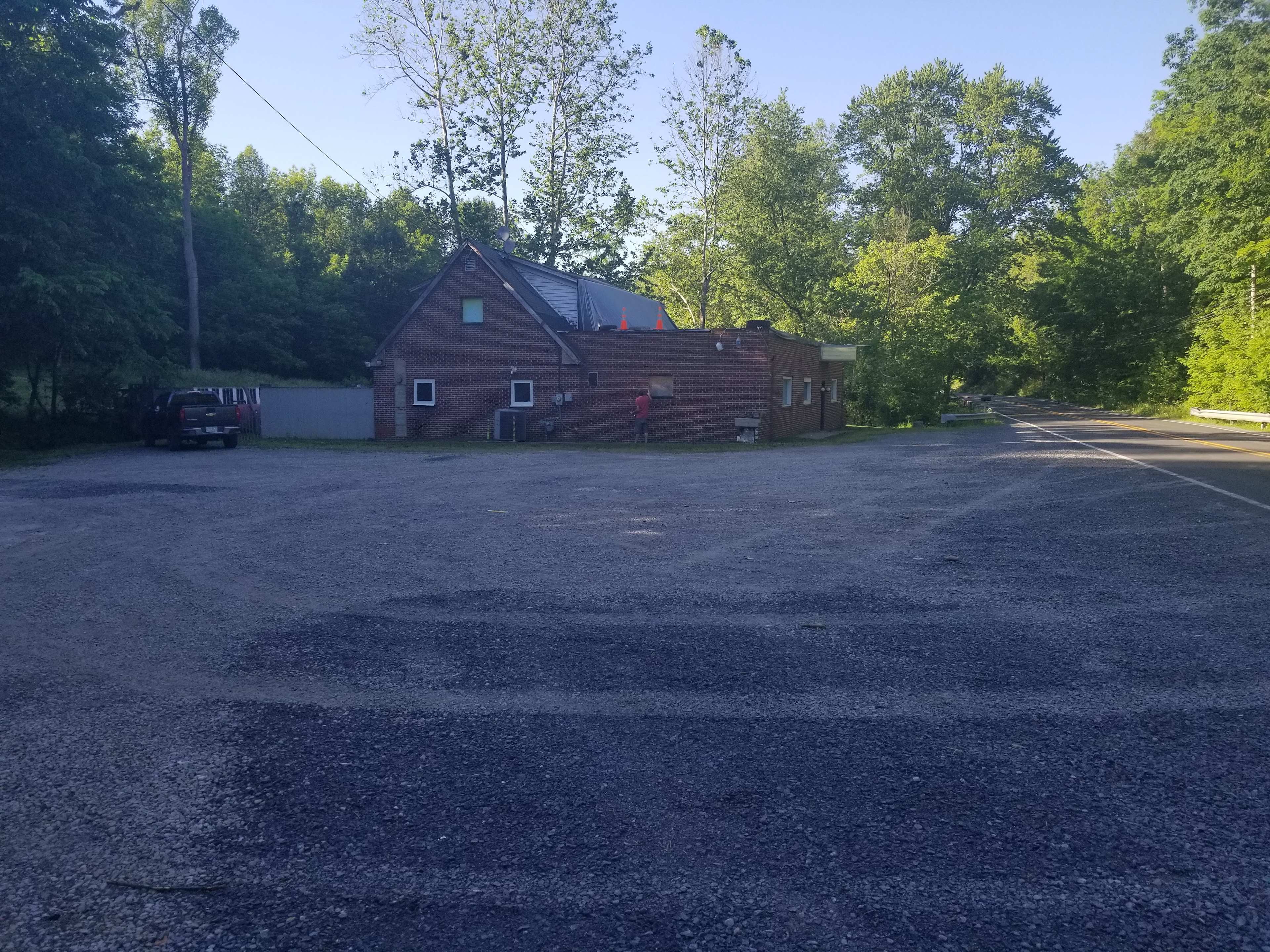 RockStar parking lot where all vehicles park for tent sites.