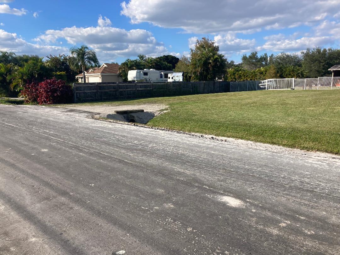 Entry to the listing, off a quiet, paved, 0.25 road.