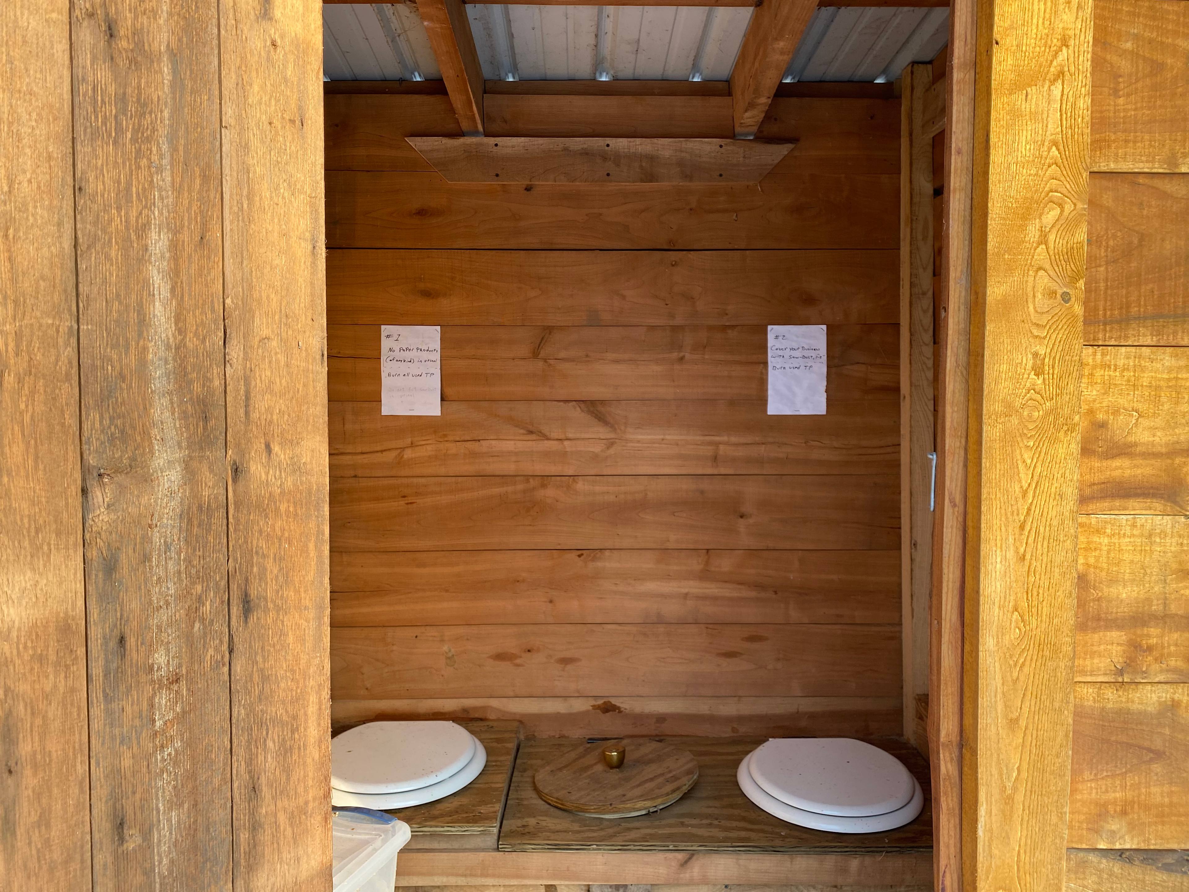 Two holes, one so females can sit and pee (males can pee outside), which is only for urine, no TP or other material. The second one is for #2, saw dust based, cover it up like a cat.