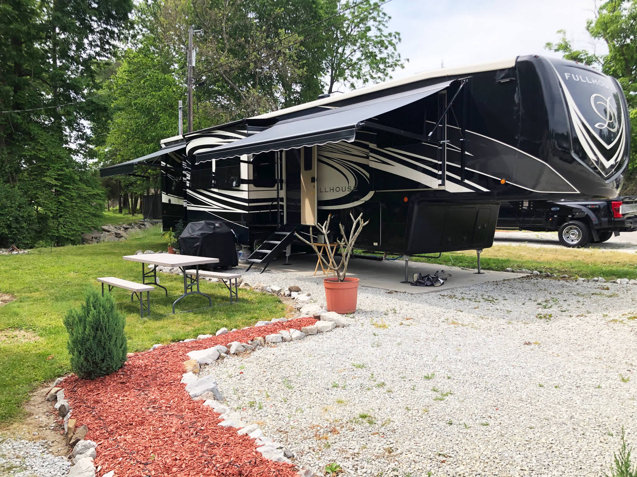 Full hookup RV Fairy land because of all the little Christmas lights that come on every night