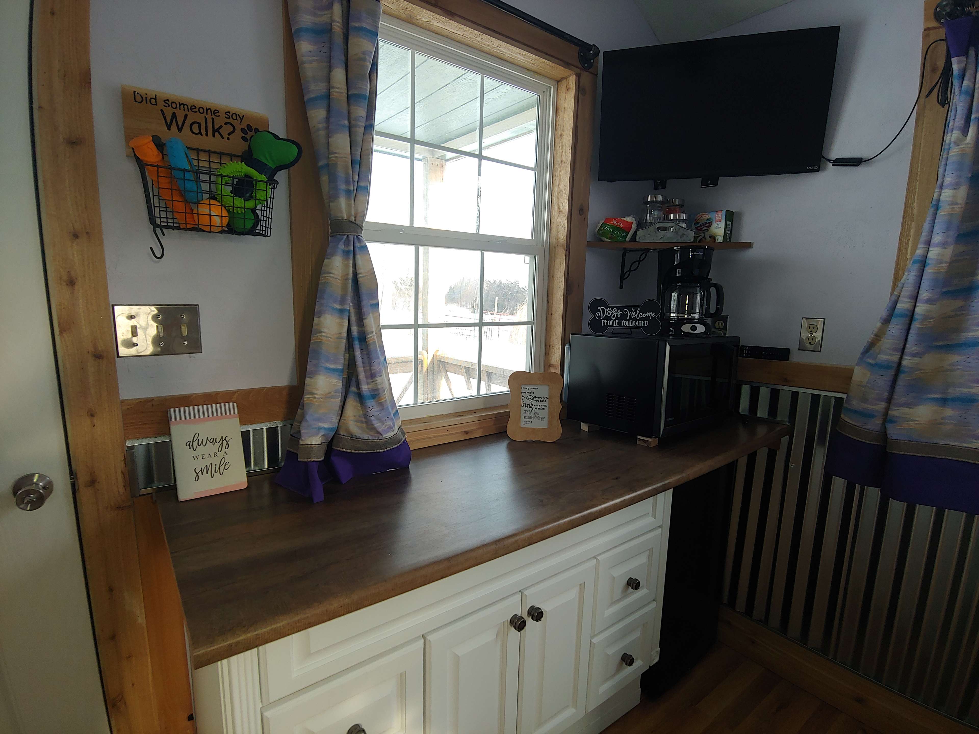 This side of our kitchenette has the mixrowave/air fryer combo and a 2 burner chocolate.