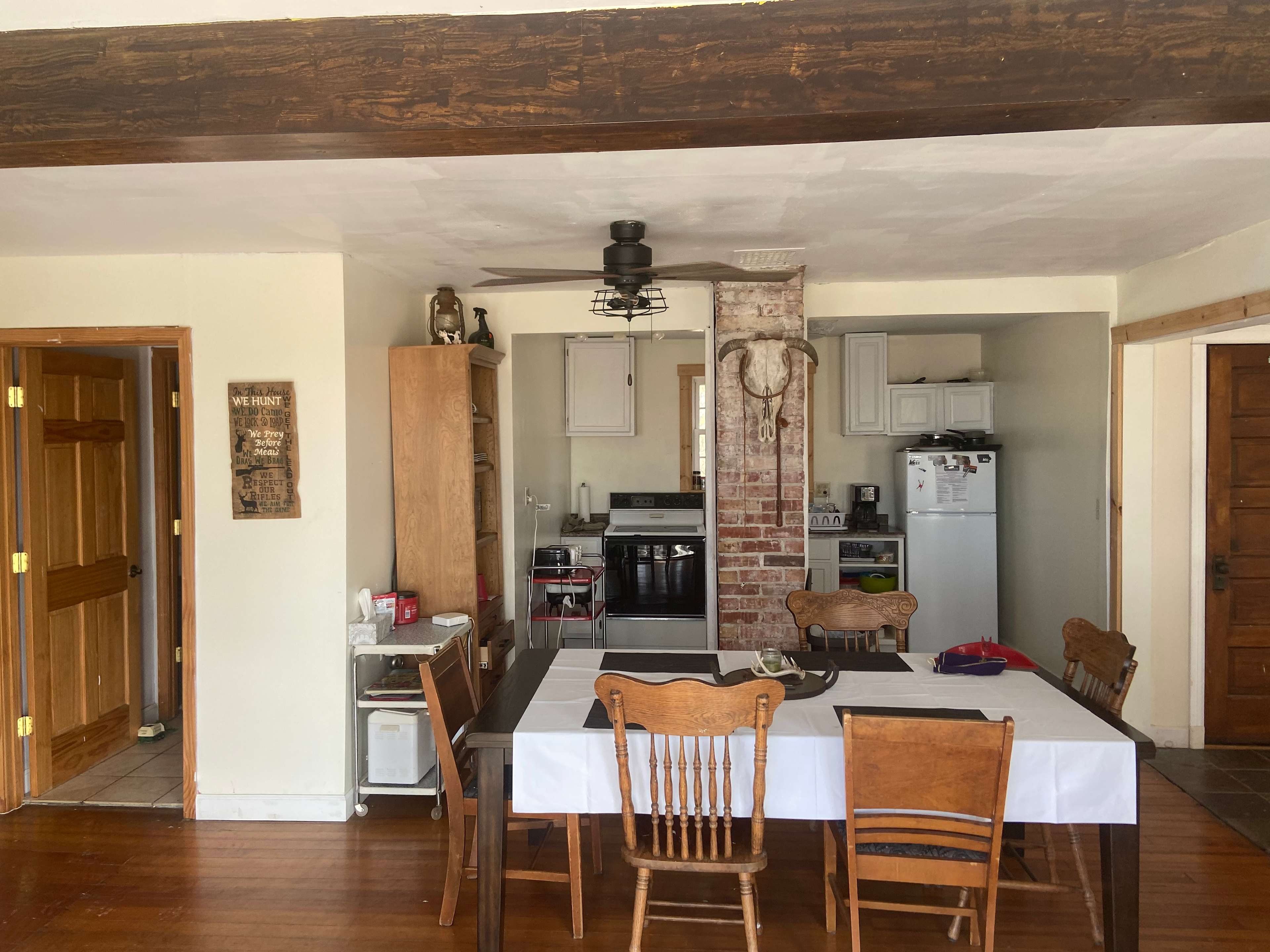 Coming in from front door.  Dining room and kitchen.