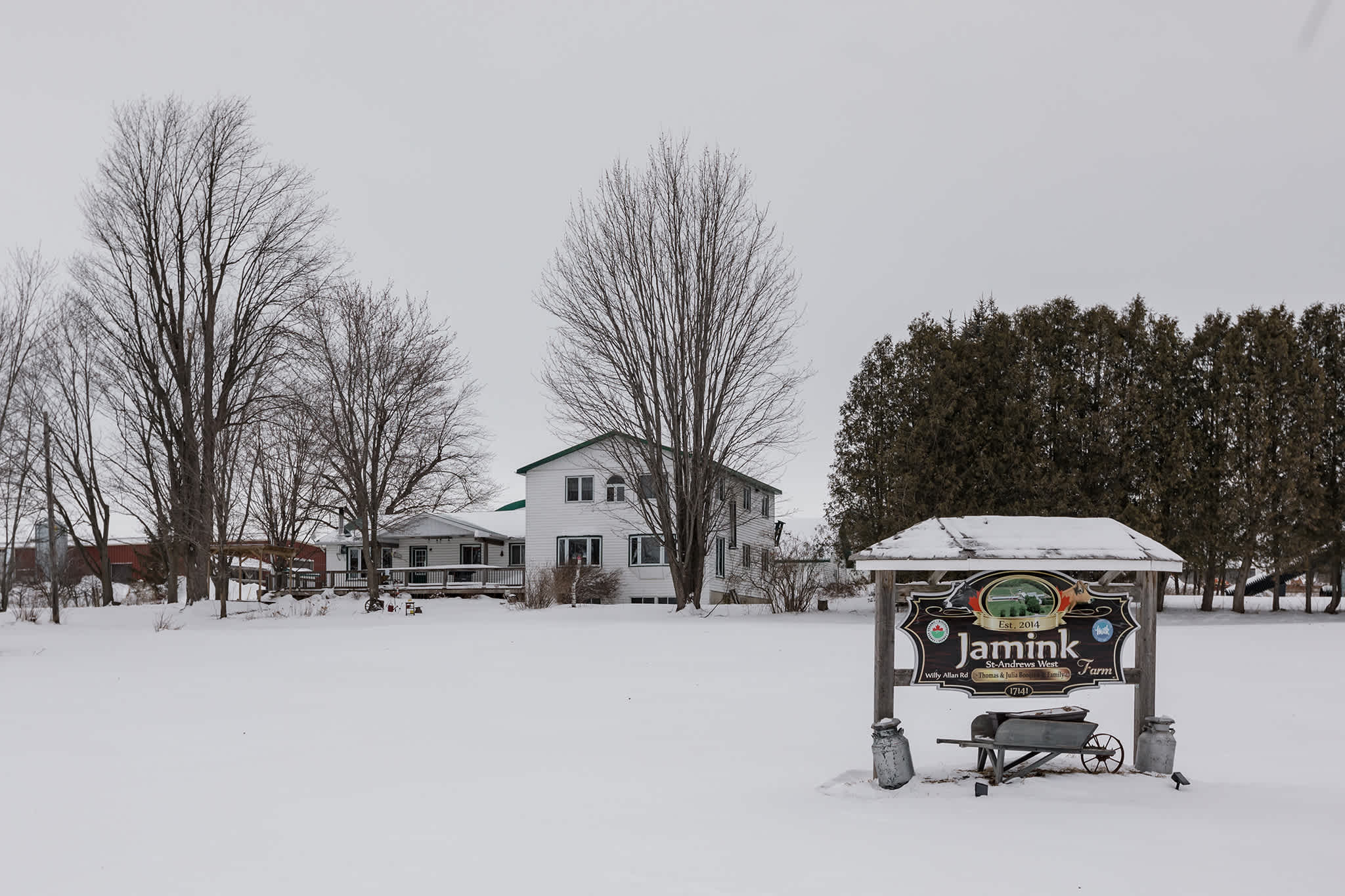 Campers are greeted with a sign that can be seen from the road advertising the family farm. 