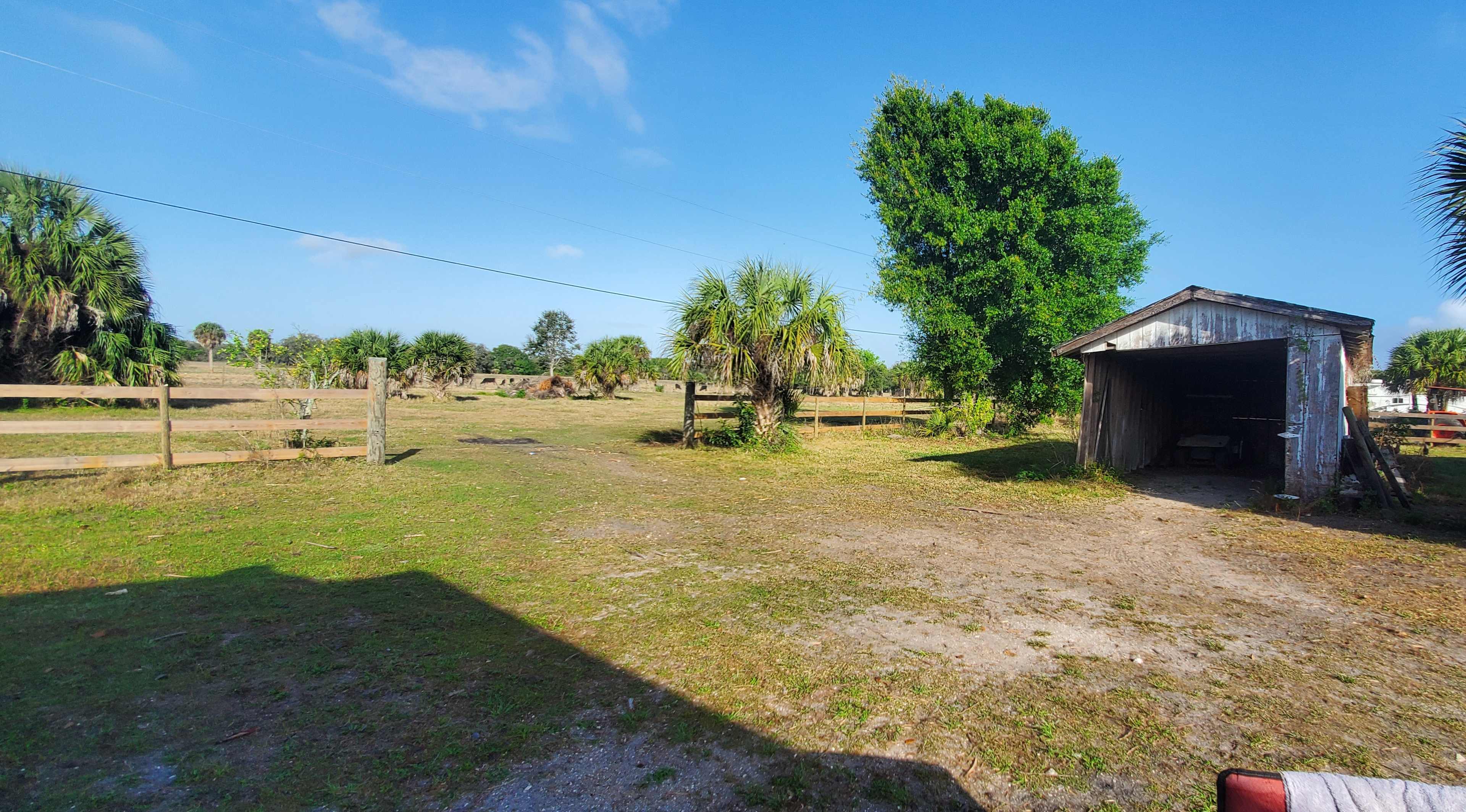 The pastureland.