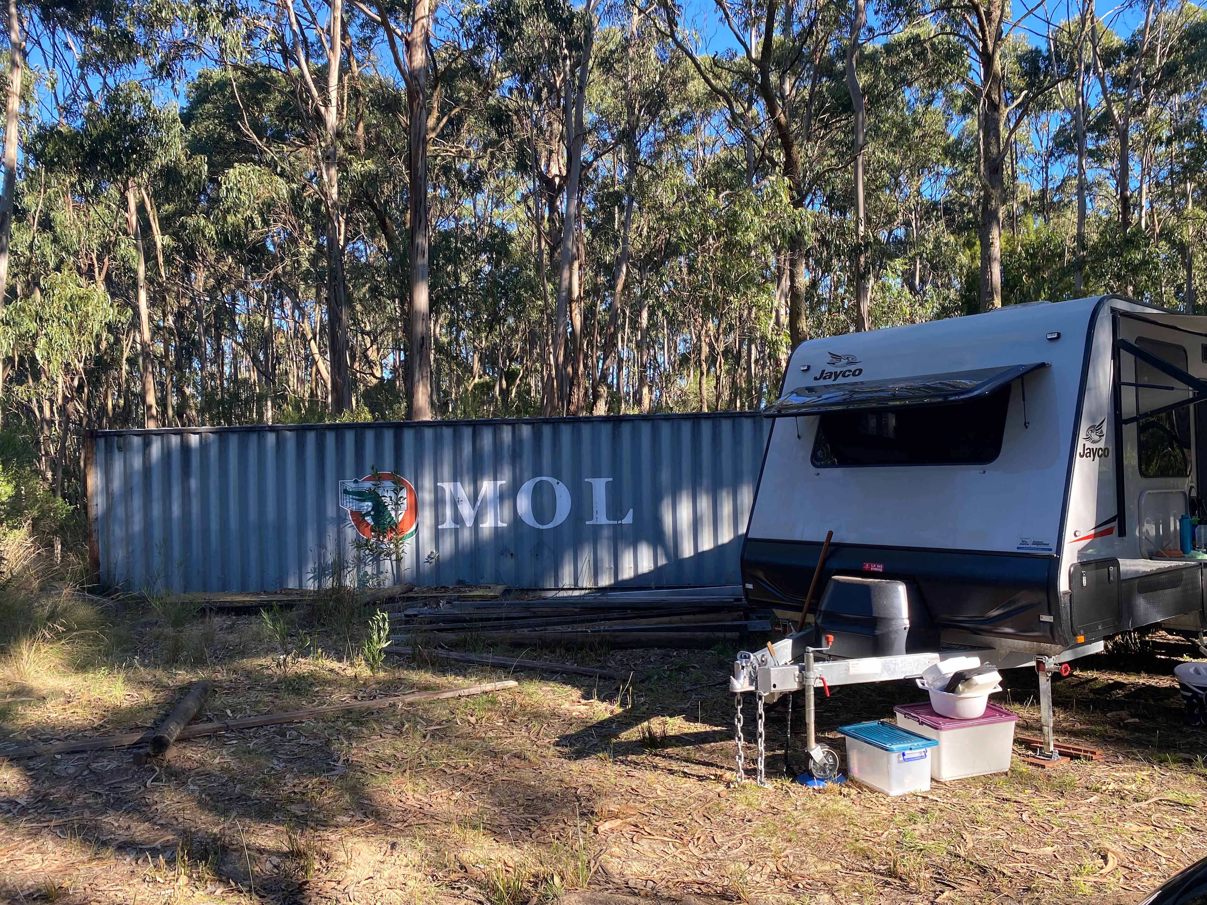 Position your caravan facing away from shipping container to maximise the view. Our 23 foot van fit in this position nicely.