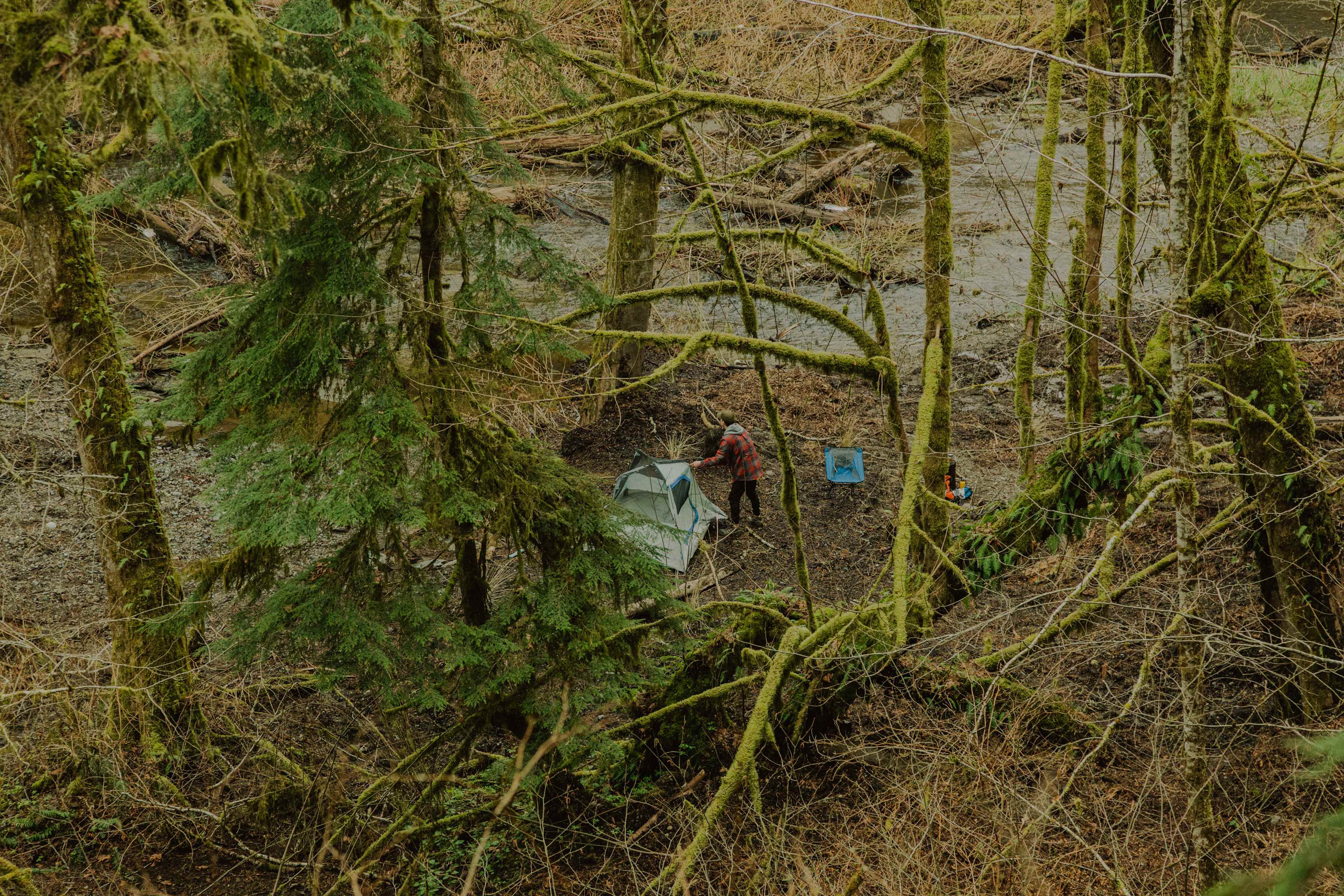 Setting up camp at the group camp site near the creek.