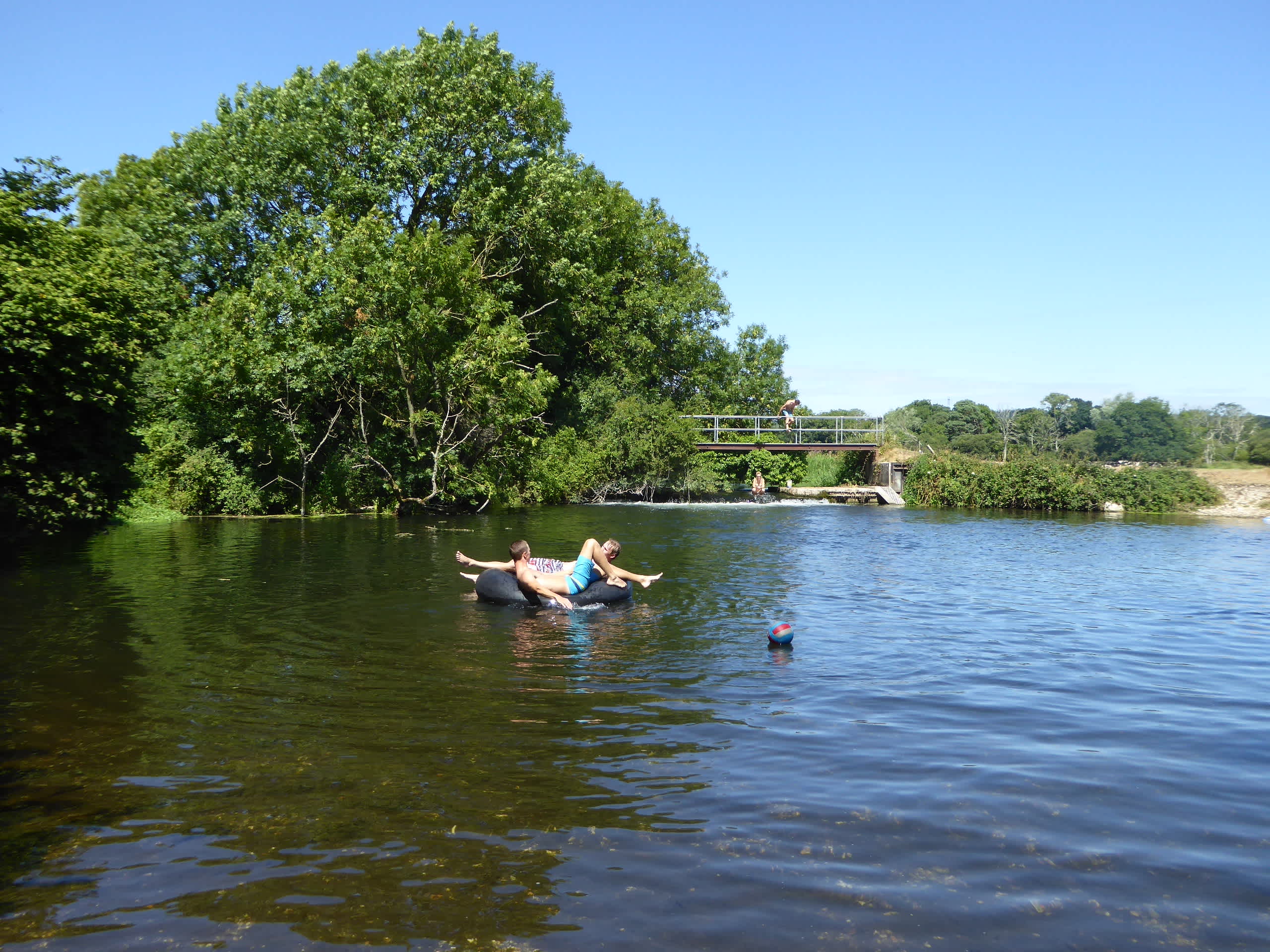 Playing in the weir pond