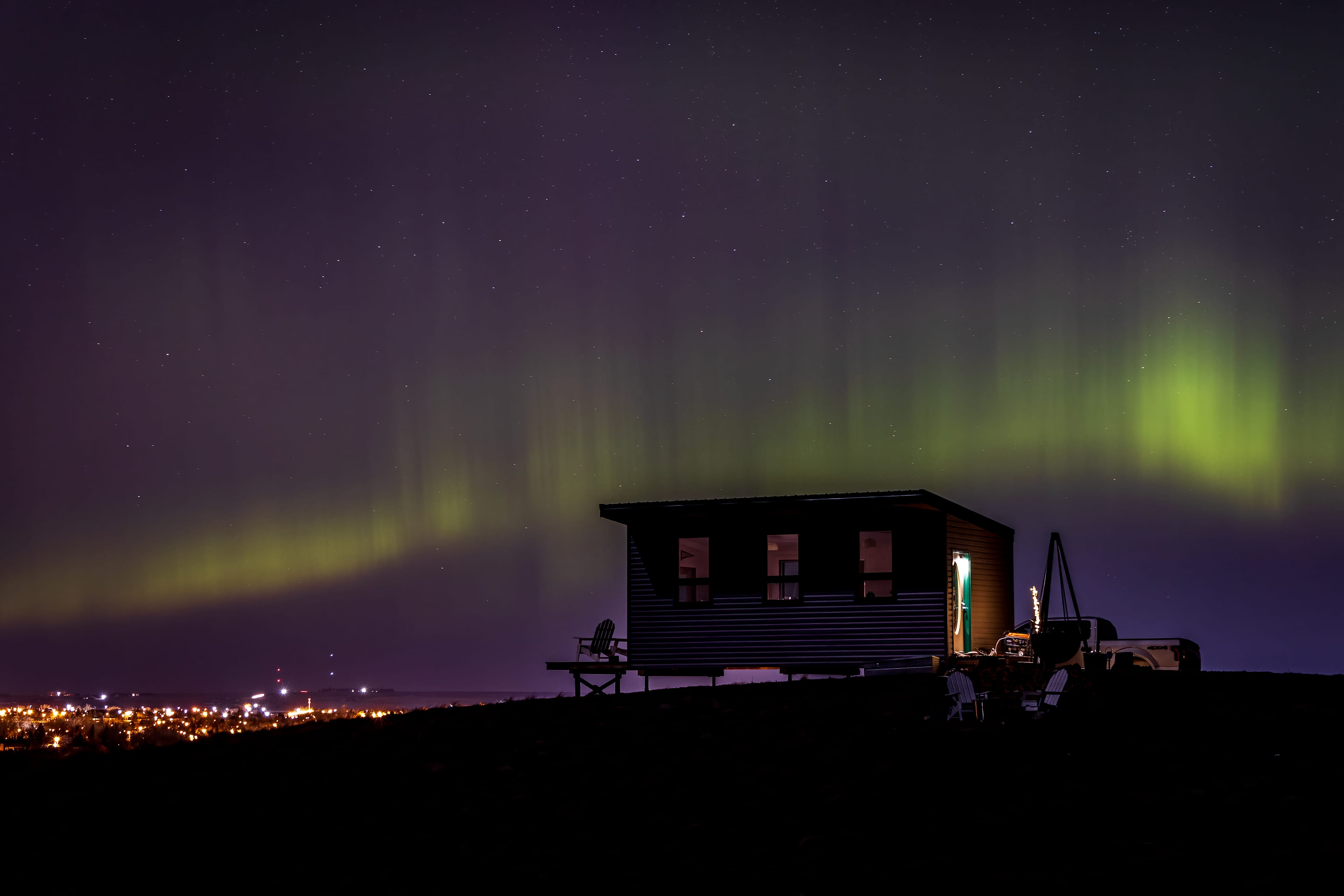 Catch a glimpse of the dancing lights out in the wide open prairie skies