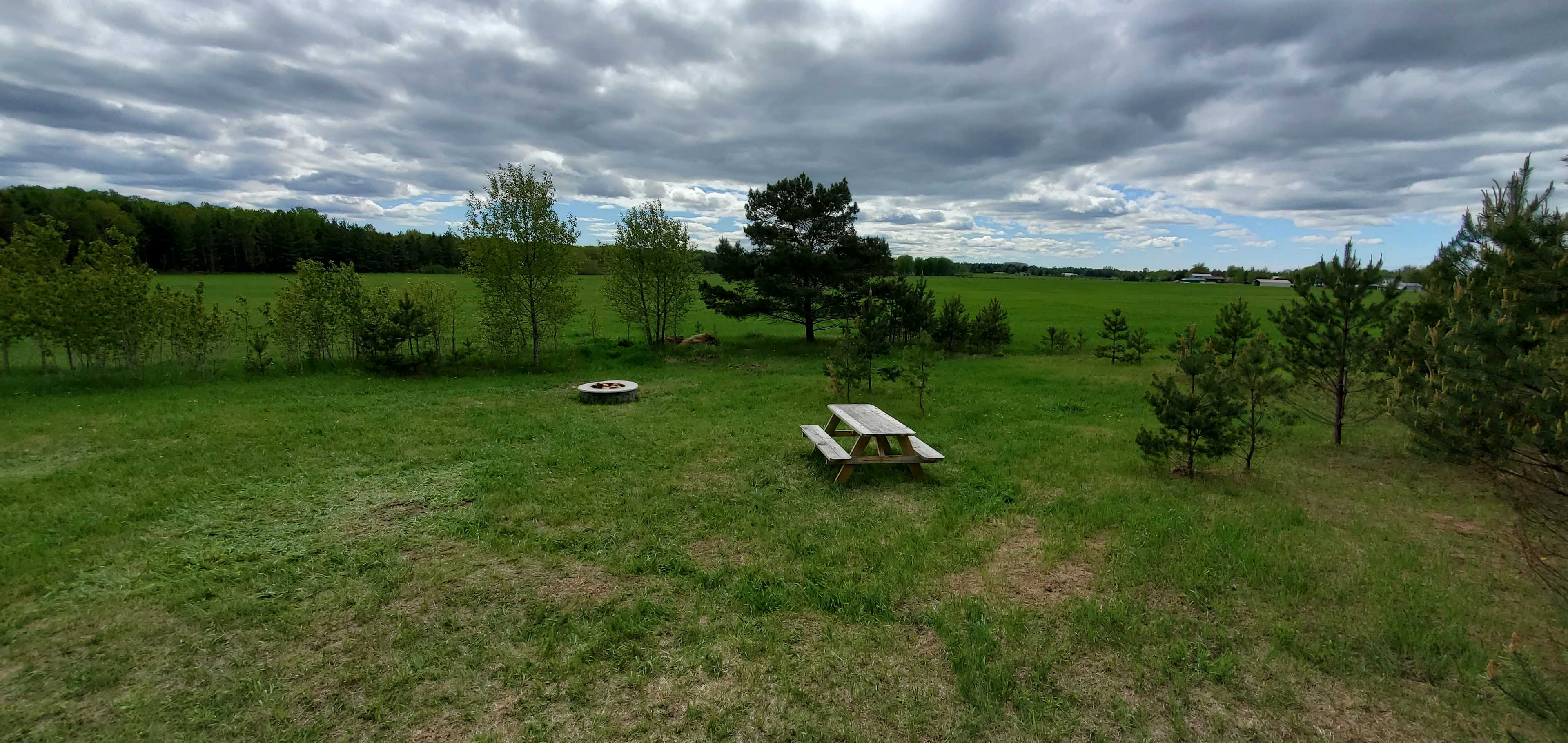 Overlooking the campsite with the prairie in the background