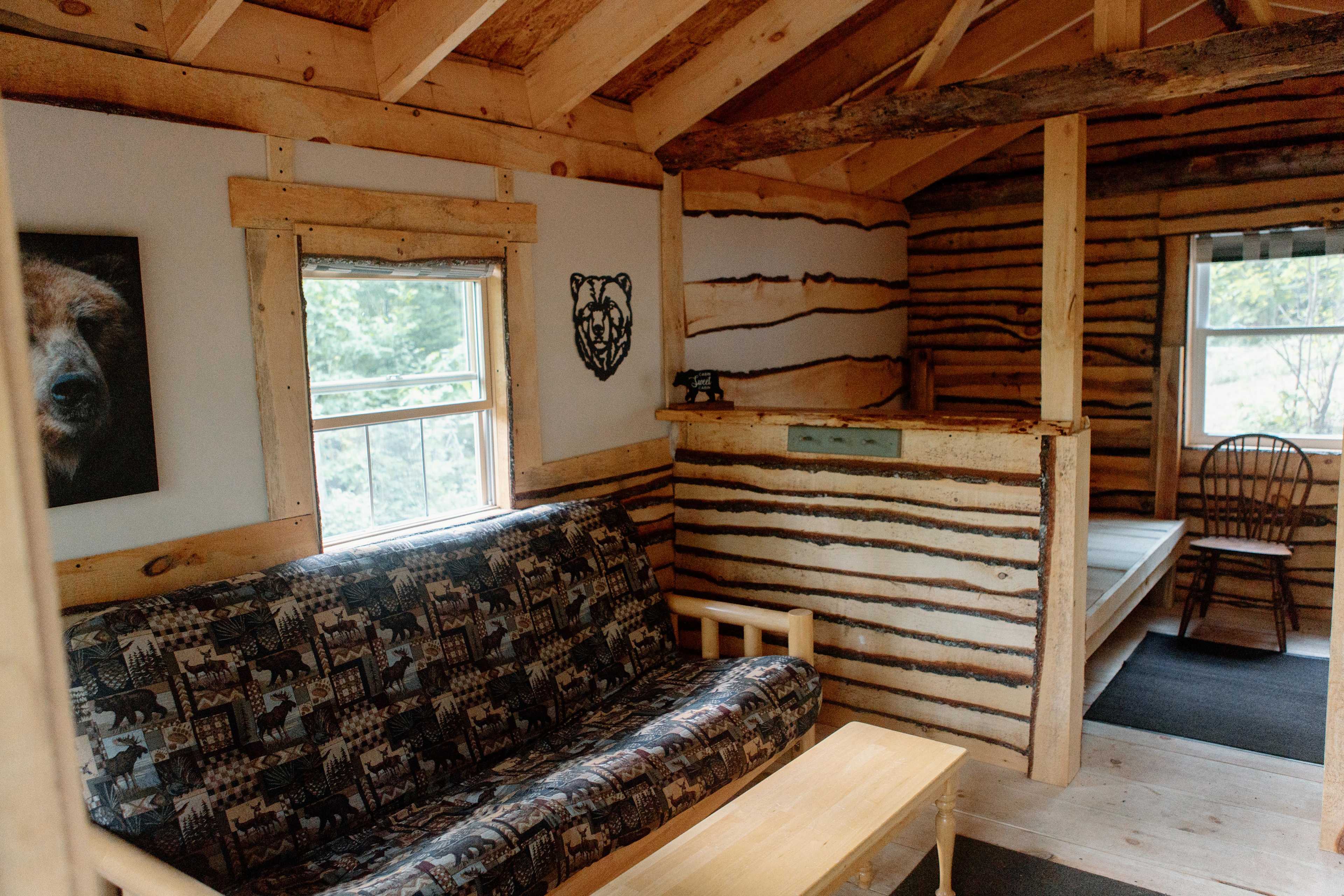 the couch in the lounge area in the cabin 