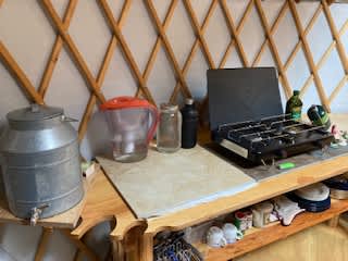 Camp kitchen with two burner and sweet well water