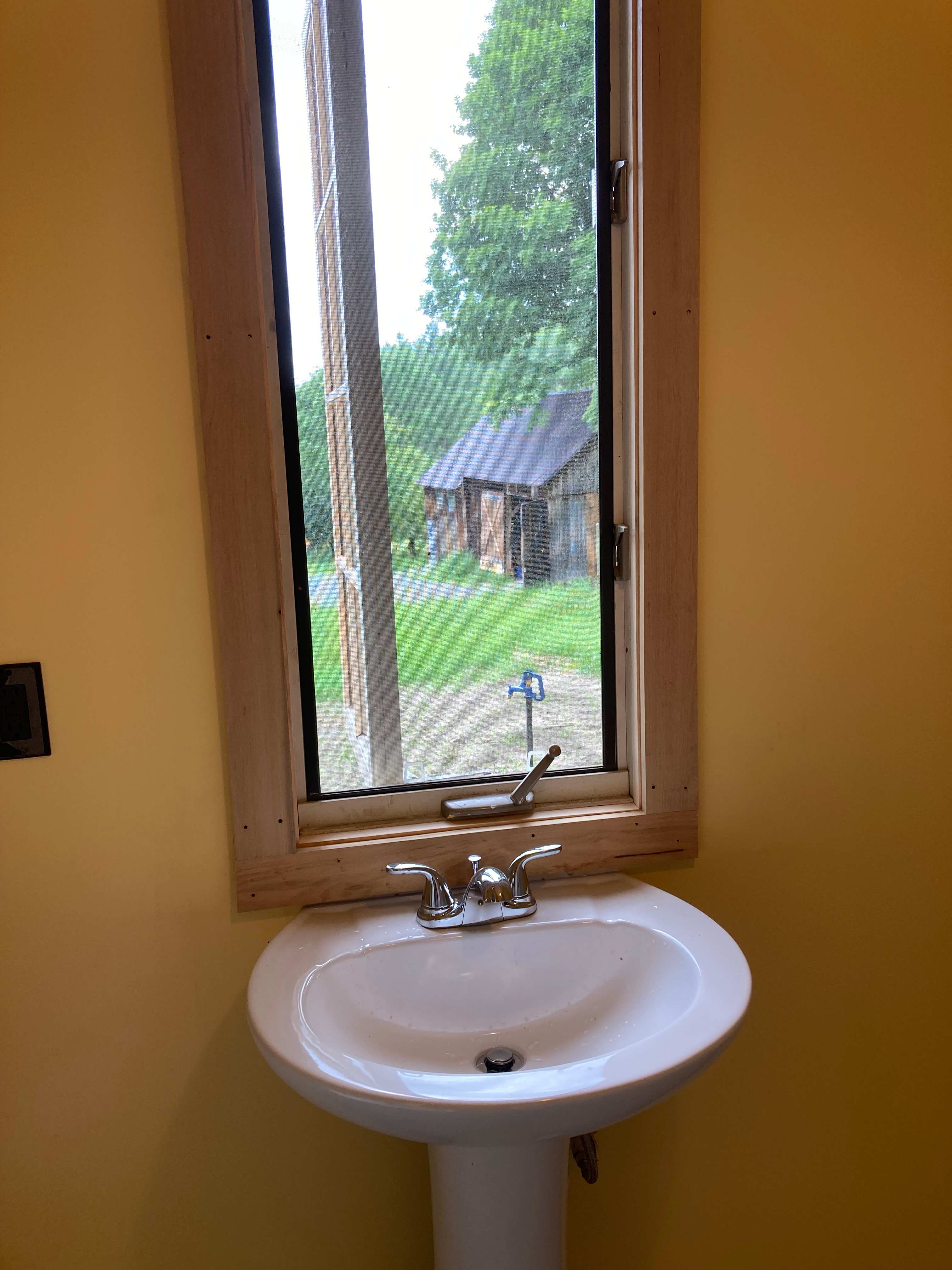 Natural light and a beautiful view while you freshen up. 