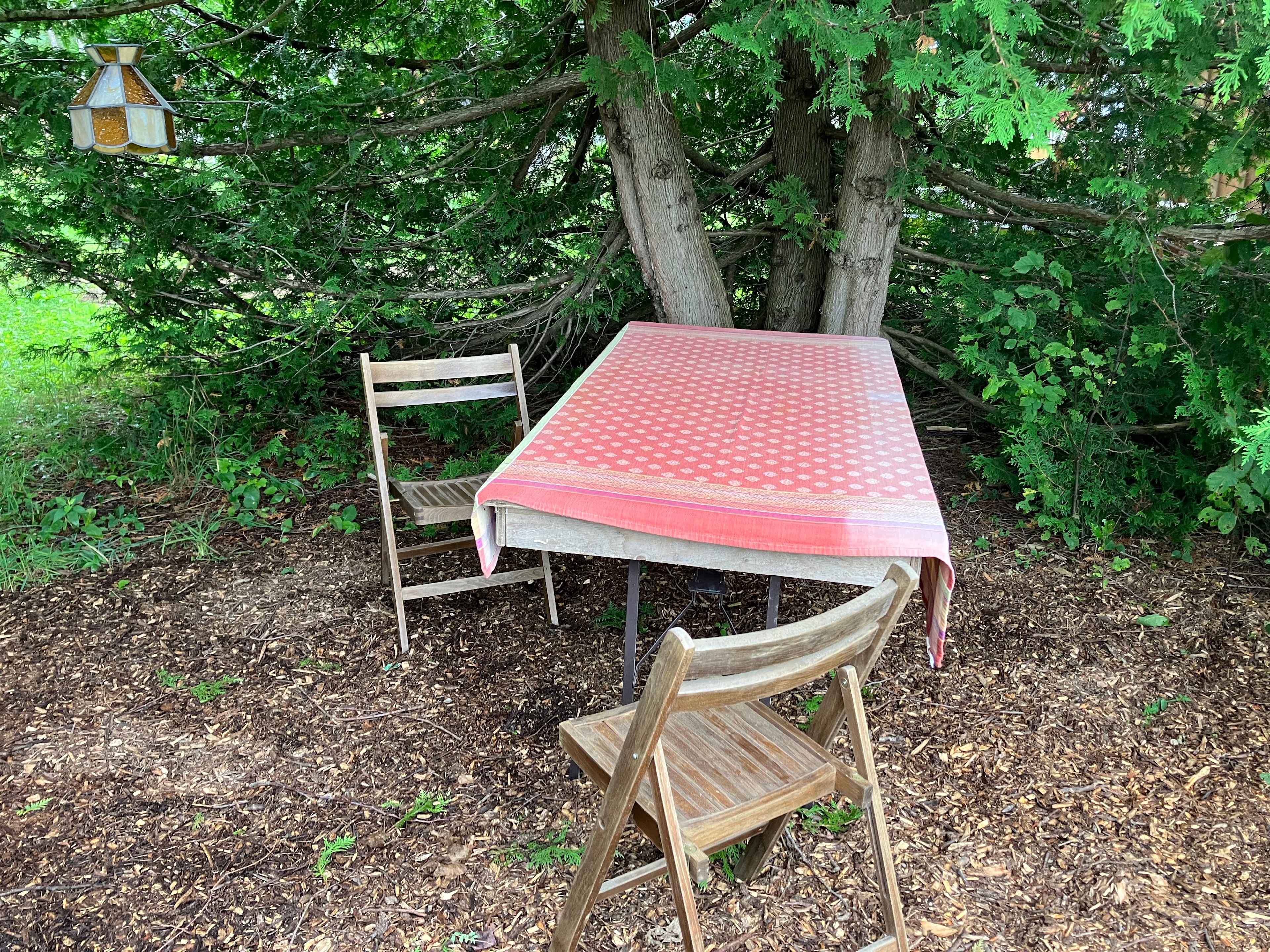 Table and two chairs for your comfort - the extension cord reaches the table so that you can keep your devices charged
