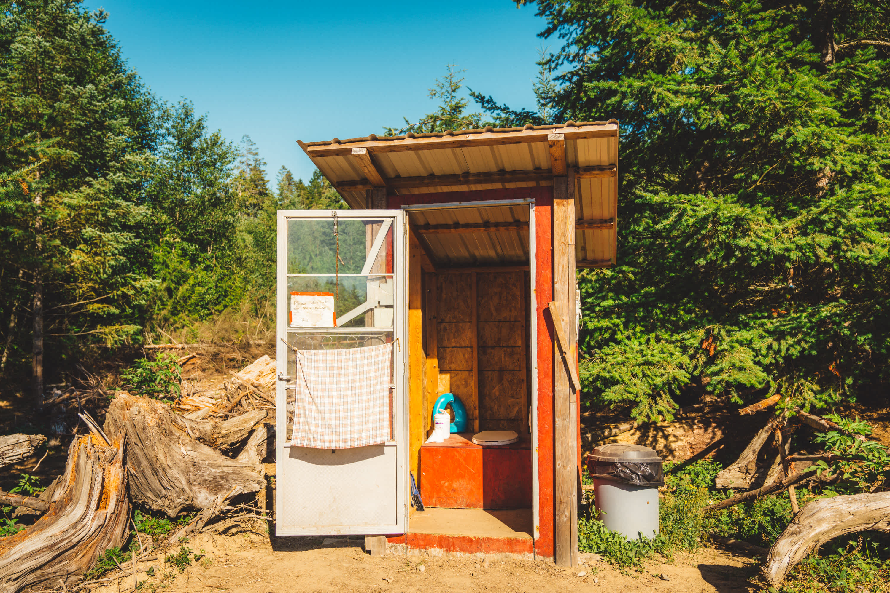 The outhouse located near the horse barn. 