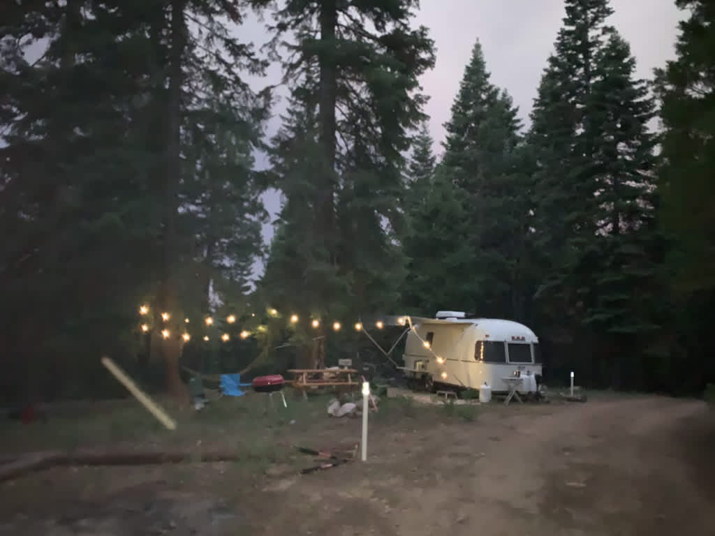 VINTAGE 1977 AIRSTREAM parked at the campsite!