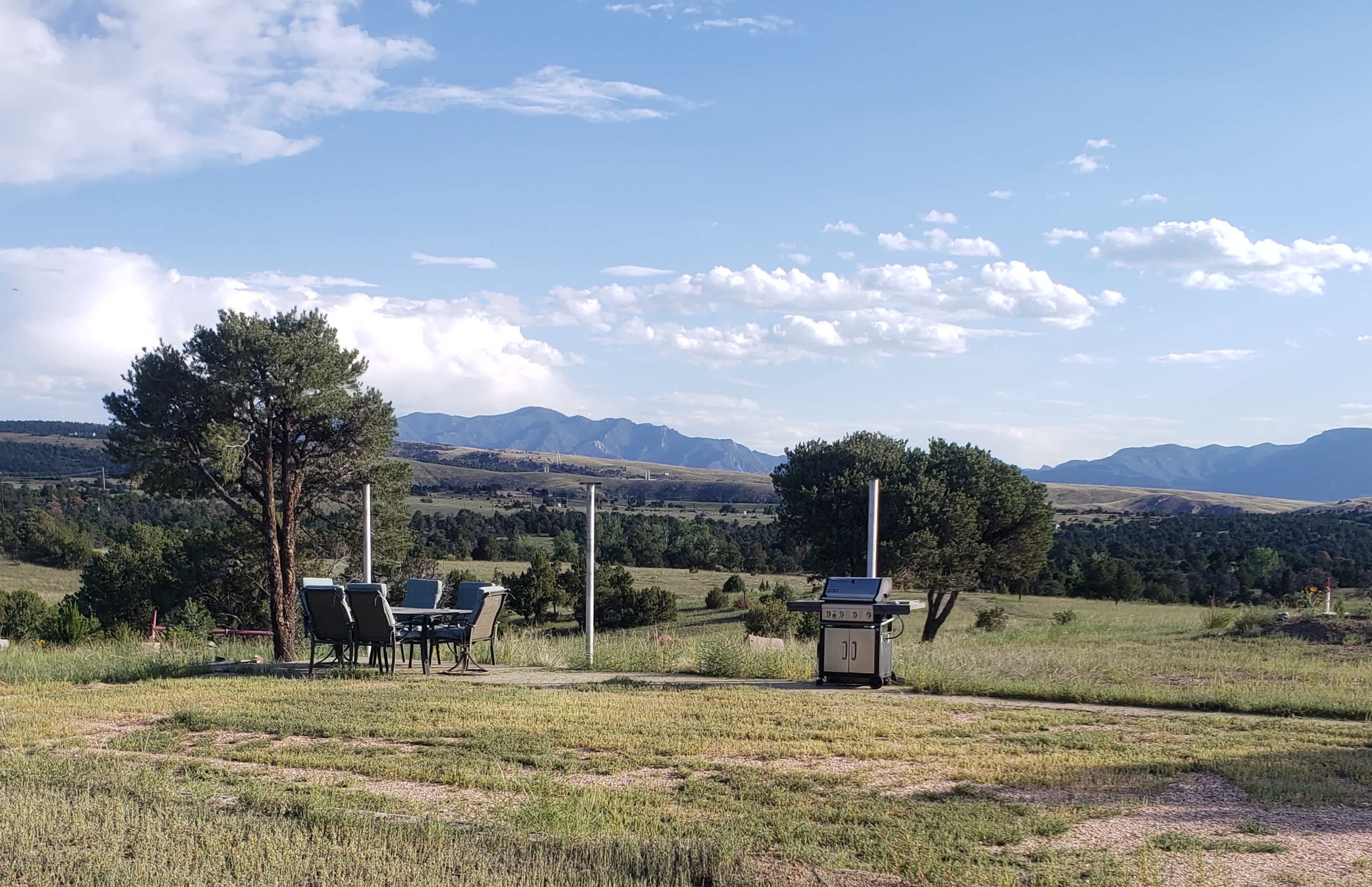 View from drivers side of pad. Passenger side would open up to the picnic table, grill, and concrete patio. 