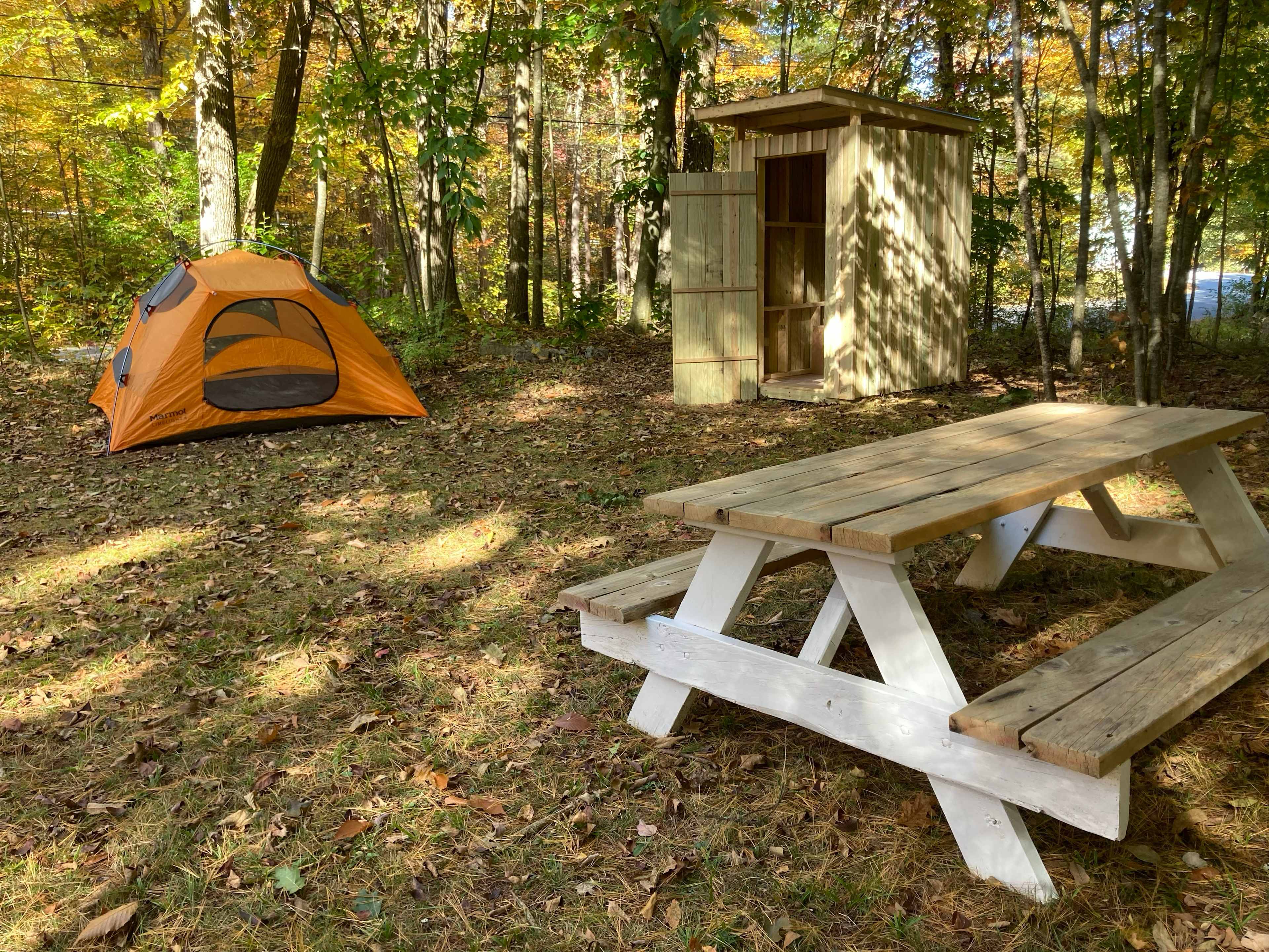 Four person tent pictured, but there's room for an eight person tent. 