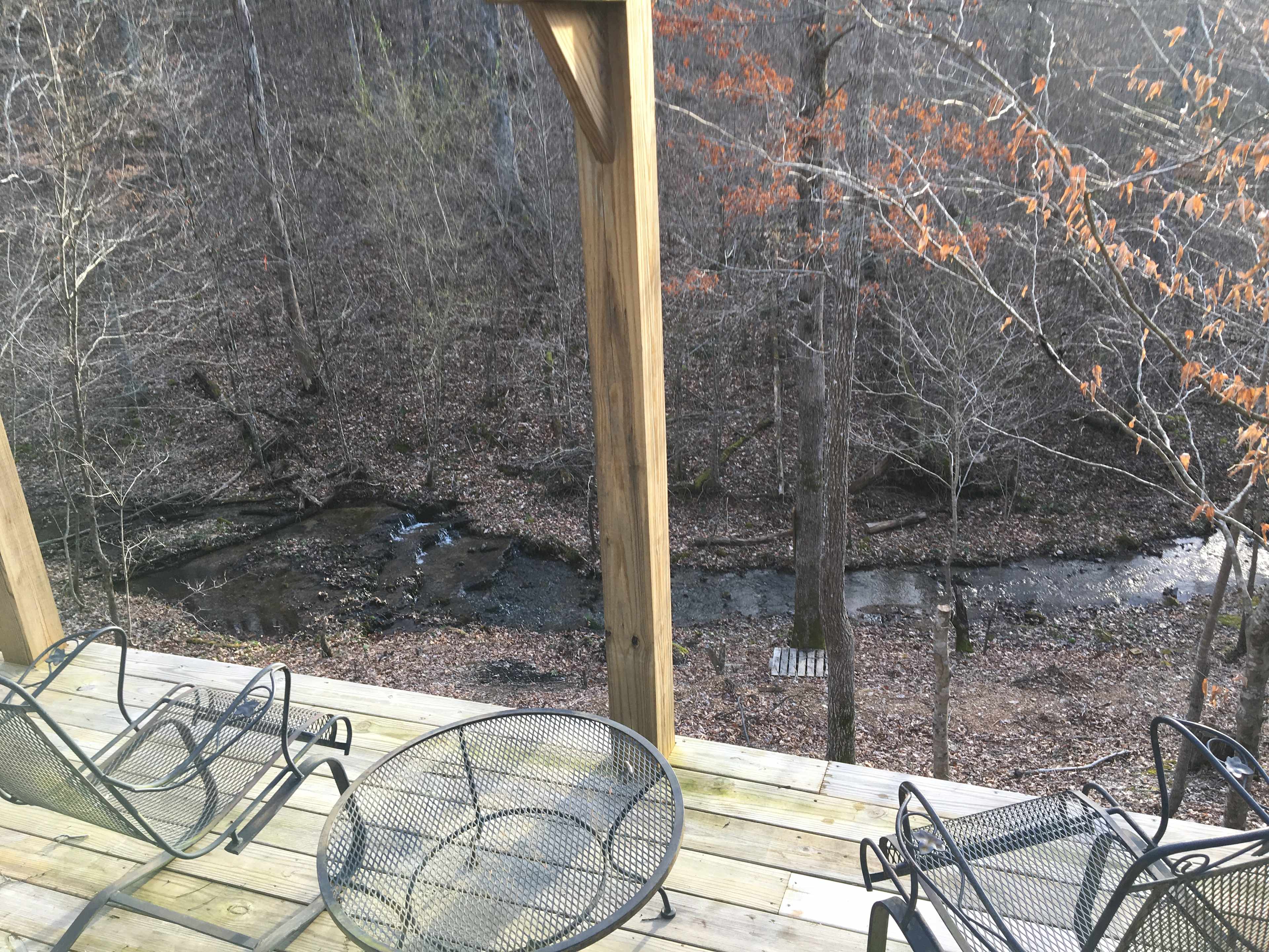 A deck with no railing above the spring in the winter.  All campsites have access.


