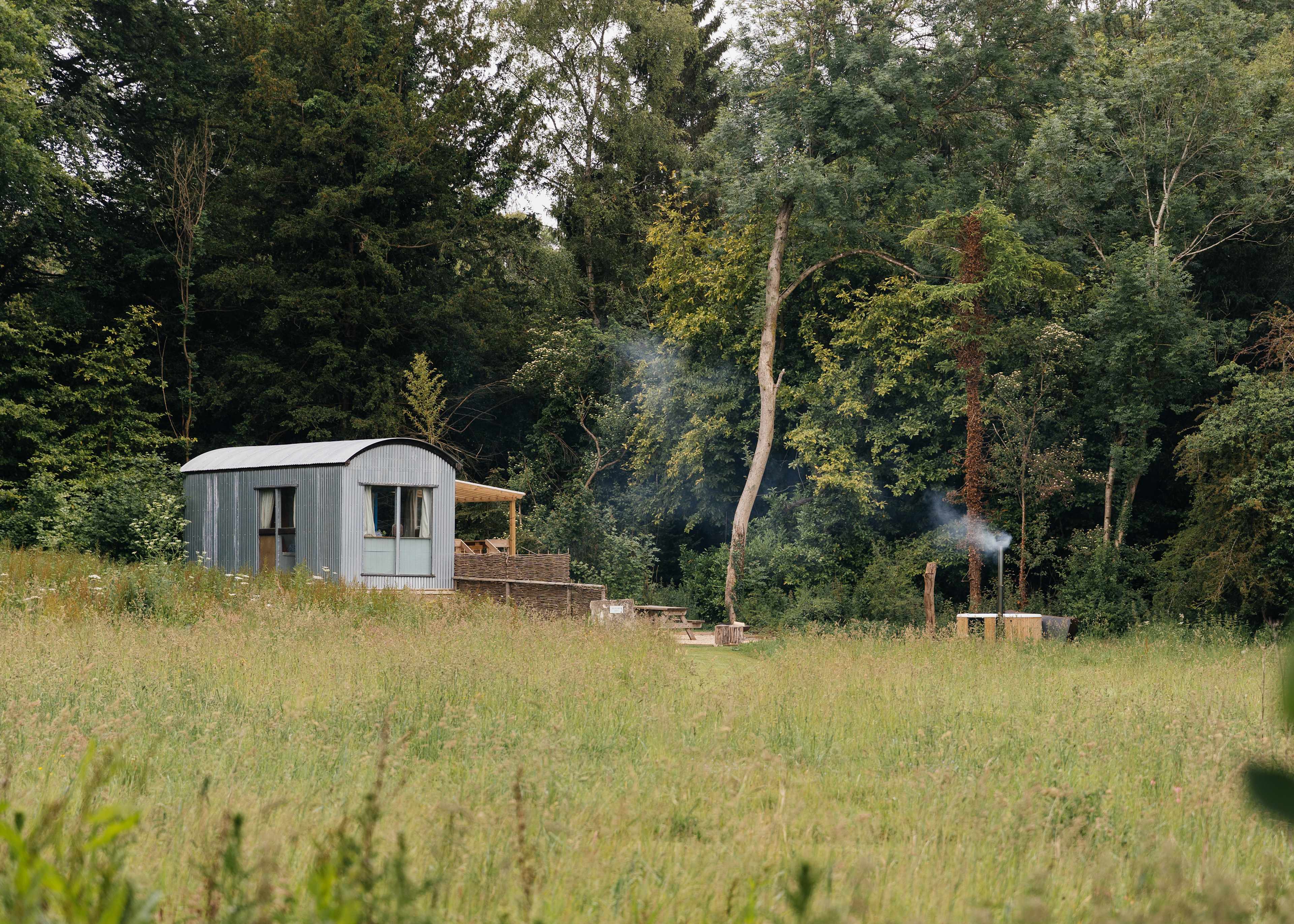 Bustard Hut sleeps 4 in a king-size bed and bunk-bed. It has it's own kitchen, bathroom and wood-fired hot-tub