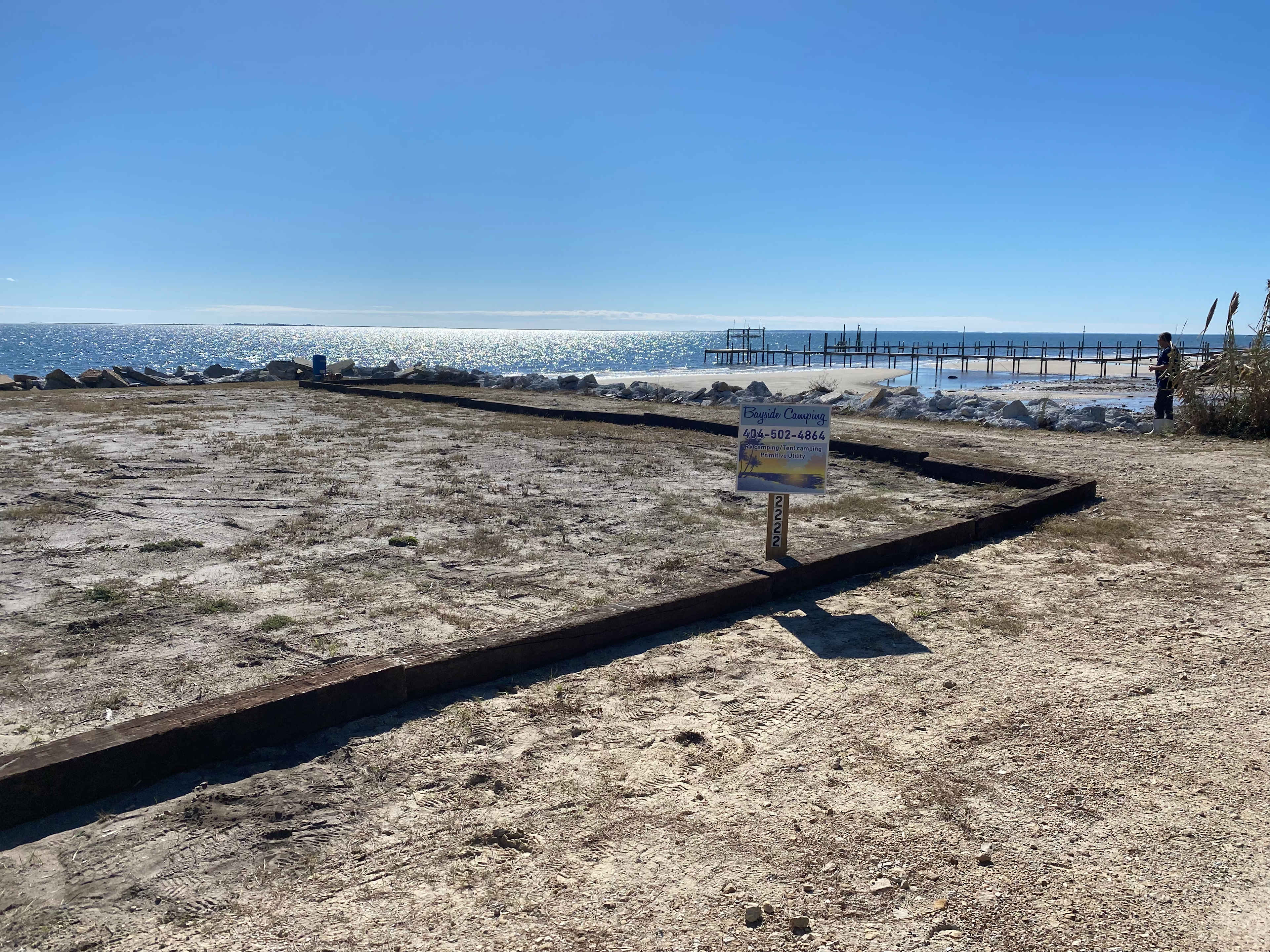 Back-in only; no pull around on Florida road base camping pad 16’ x 50’.  There is only 1 site; entire area included for use.  No shared space.