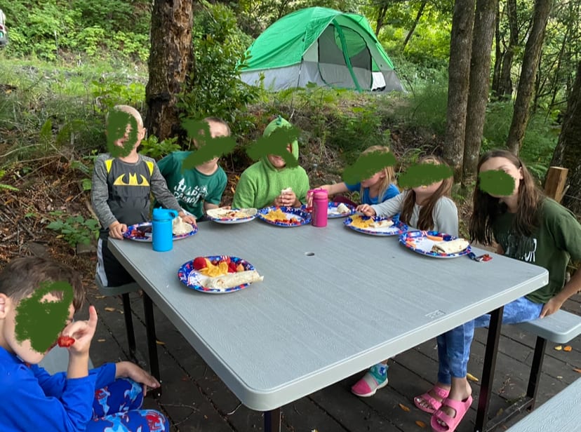Breakfast on the picnic table on the deck (photo taken July 2022)