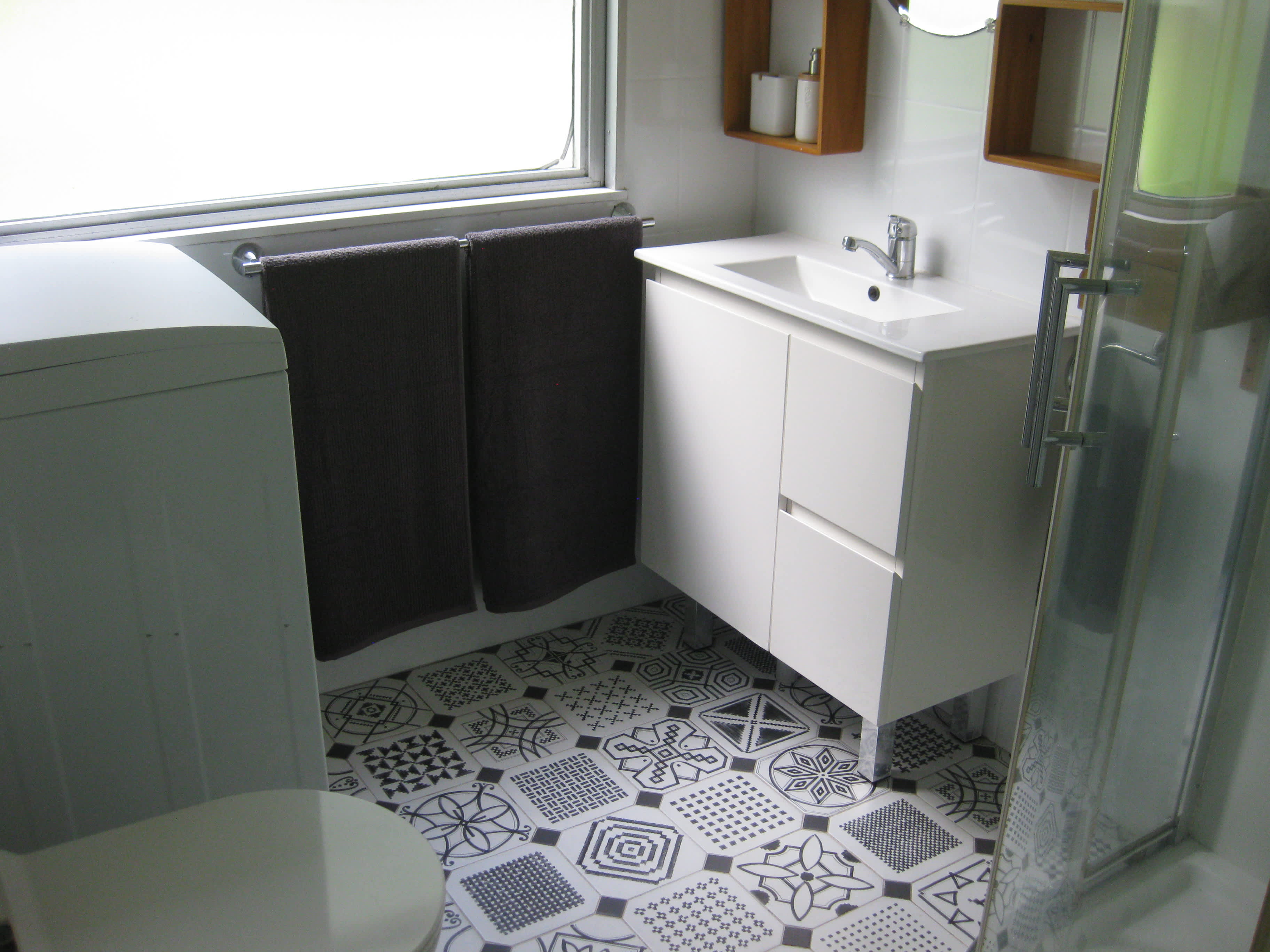 En-suite facilities.  Shower is hot with good pressure.   Septic system loo.         