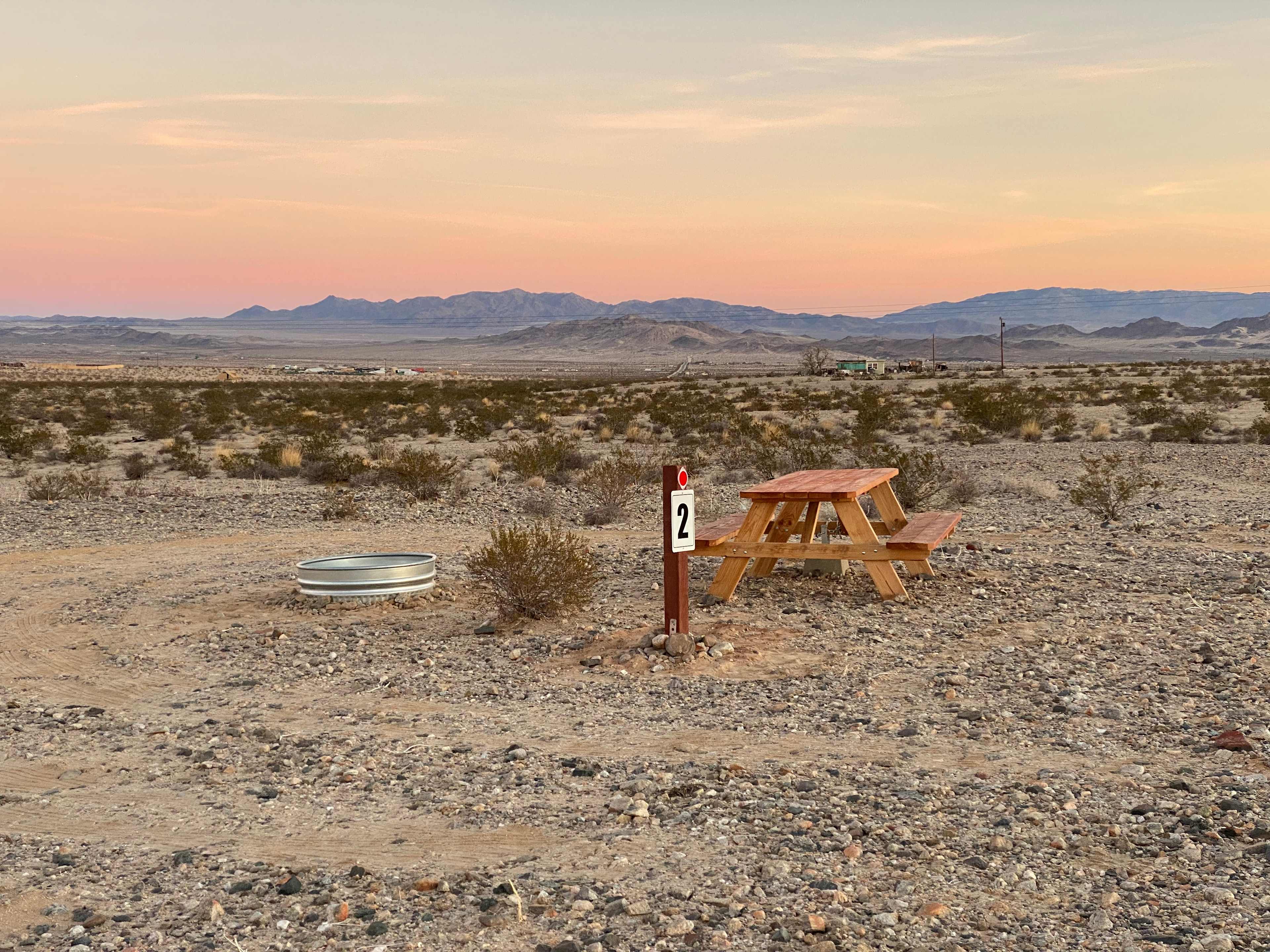 Each site is designed to have the vehicle park on the West side of the campsite so that the vehicle can block the prevailing west winds that kick up once a week.