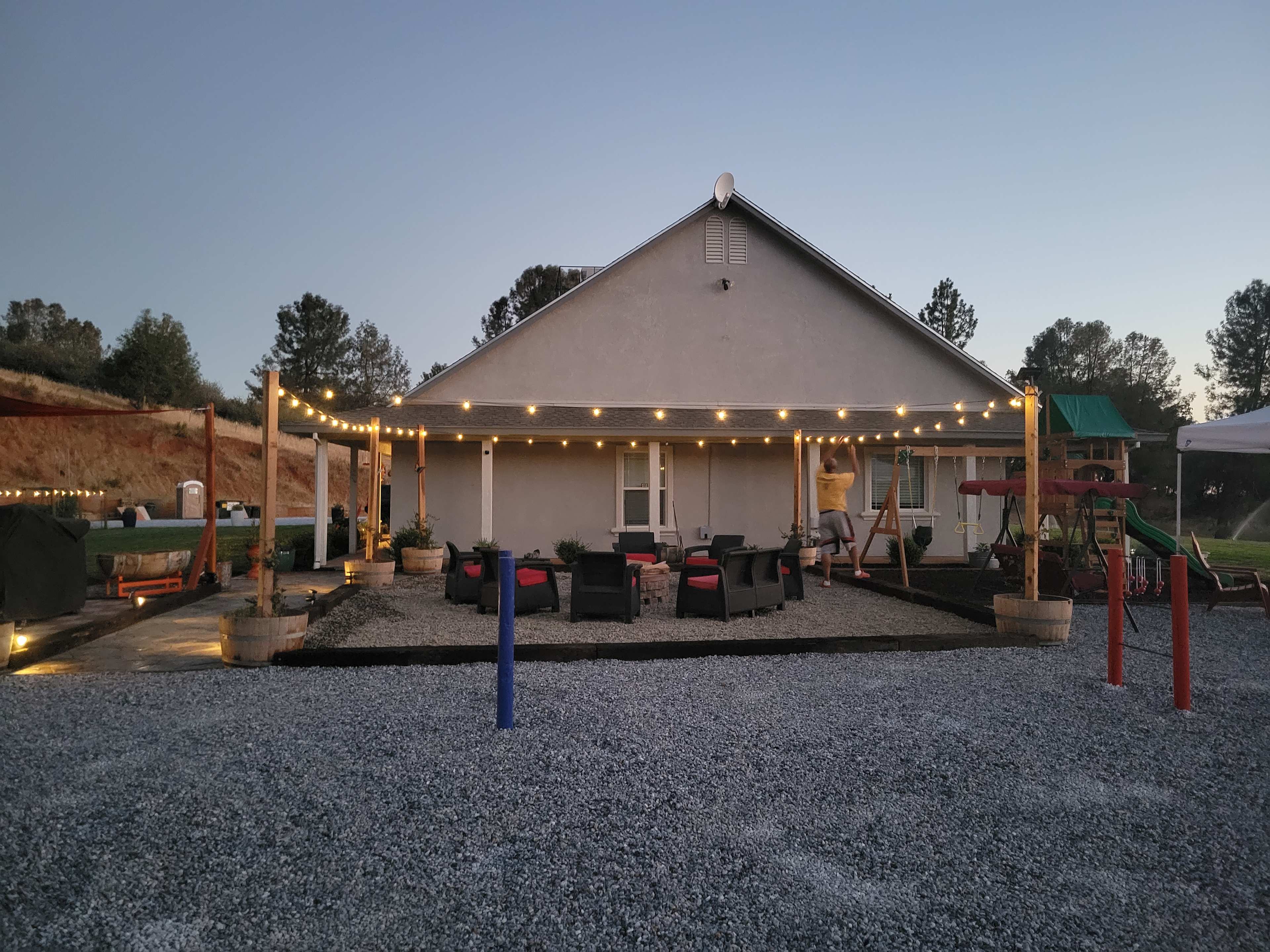 Back of property with fire pit, ladder ball, and horseshoe pits. Bocci ball and cornhole also available!