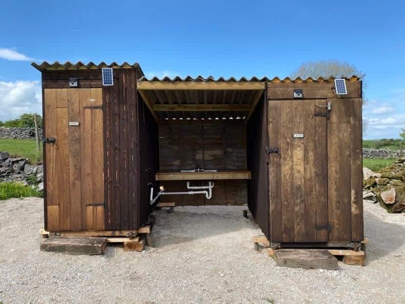 Toilets with washing up area