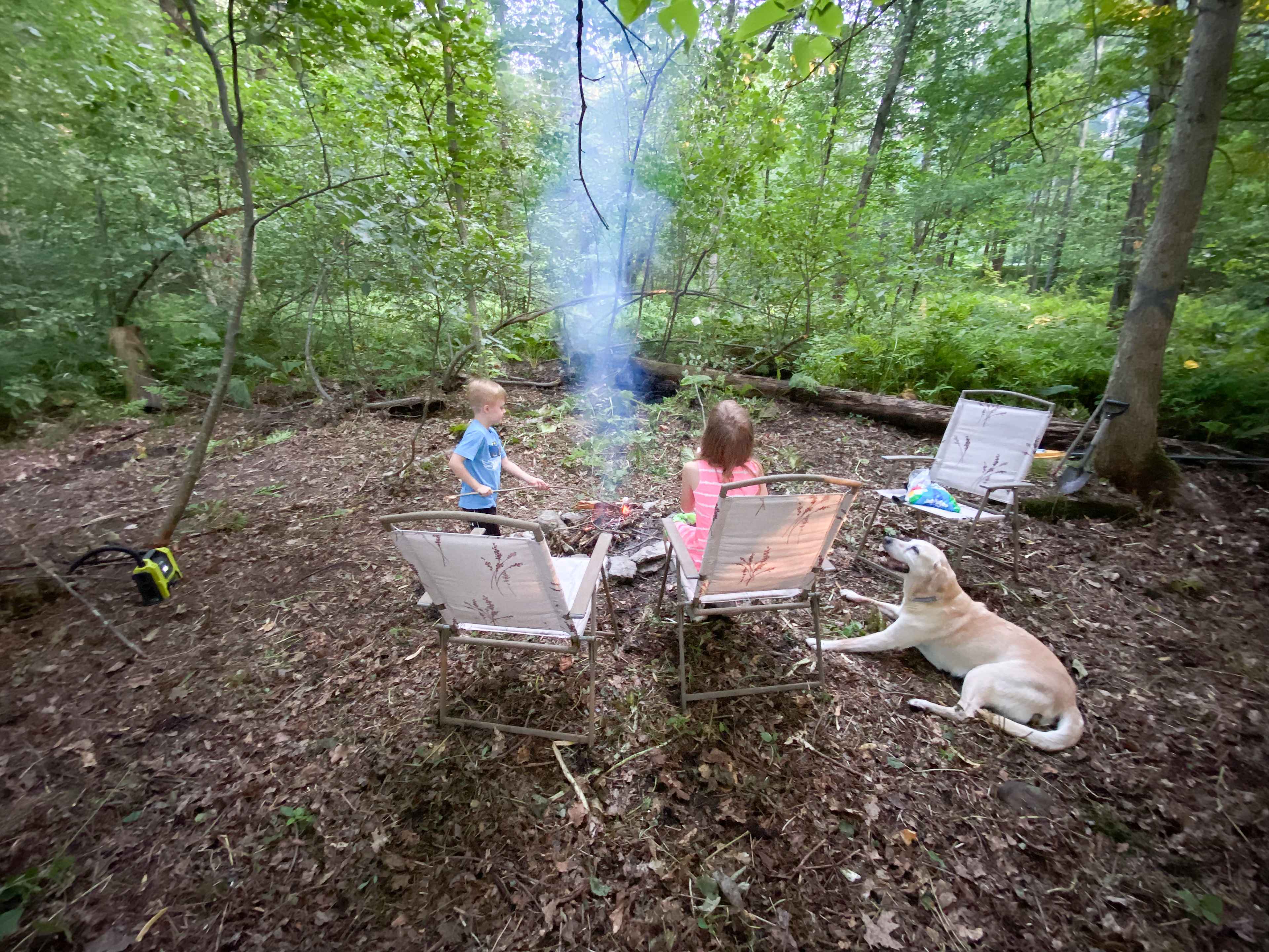 My kids cooking s’mores testing Out possible camp areas. 