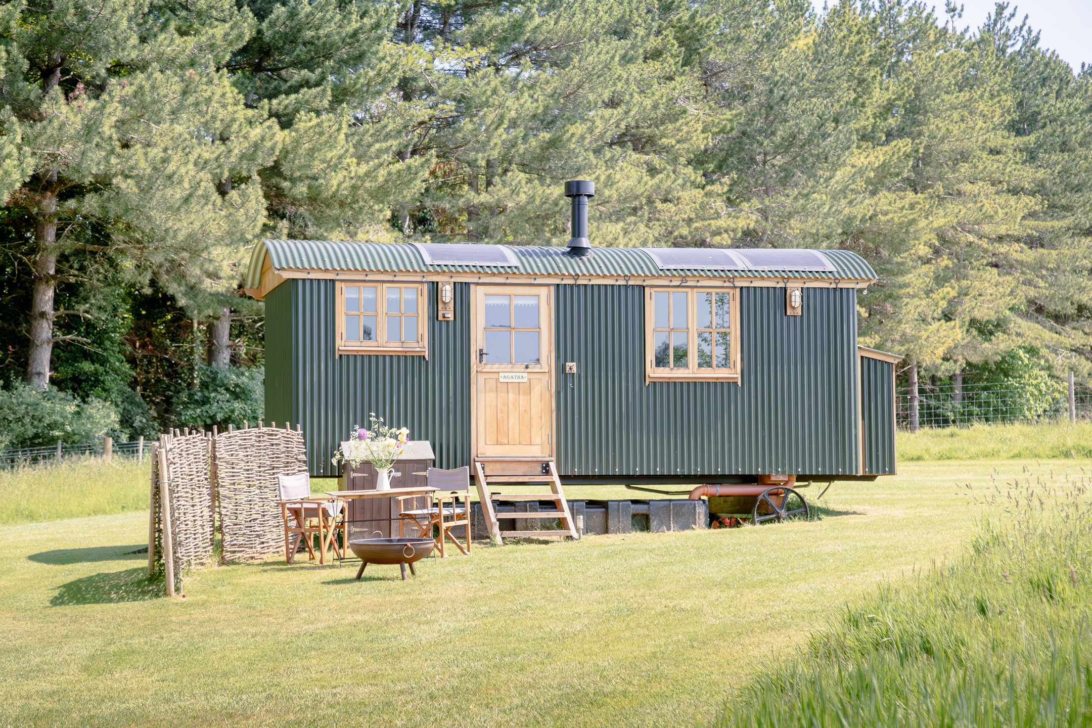 Making the most of the outdoor space, the owners have really thought well about energy use and kitted the huts out with solar panels.