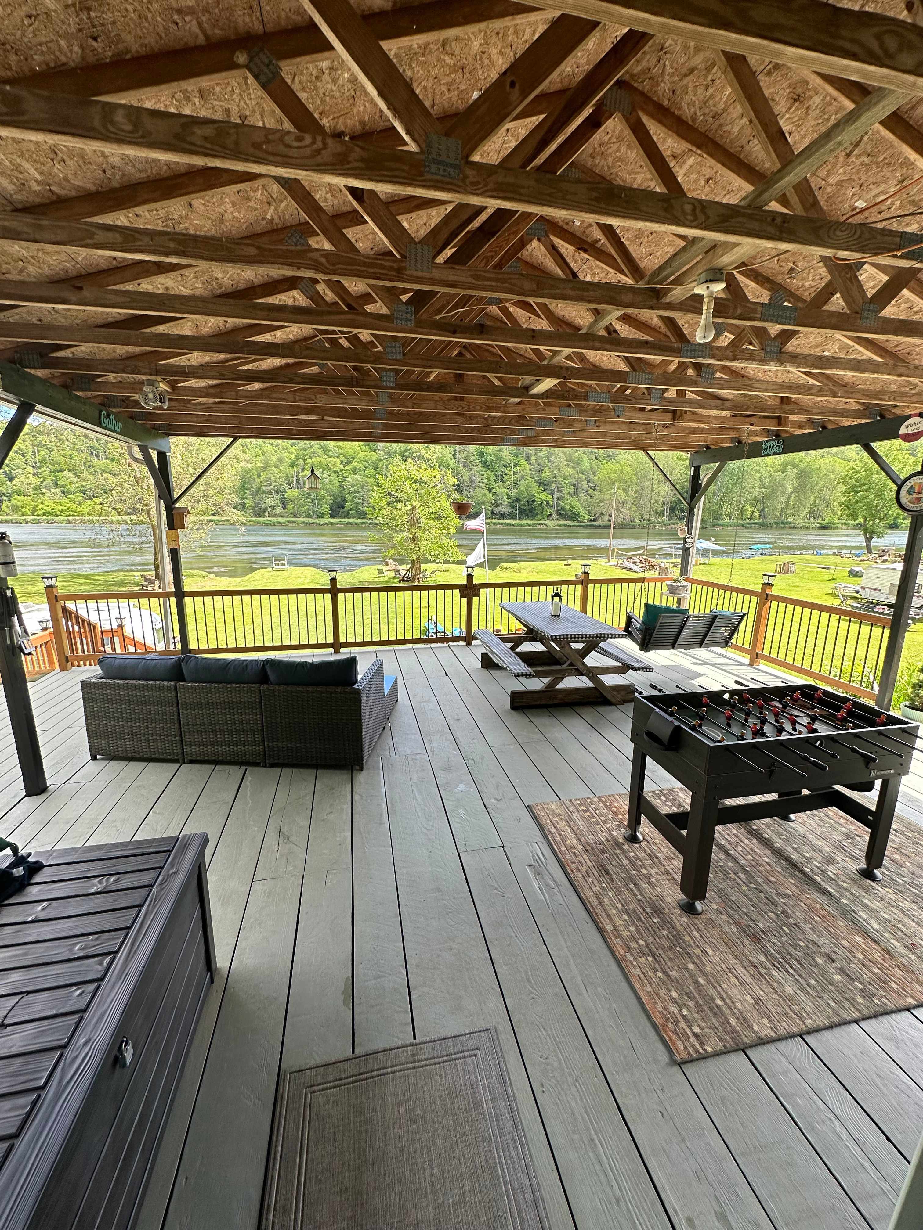 View from camper door, 4-in-1 game table featuring pool, ping pong, table top hockey and foosball
