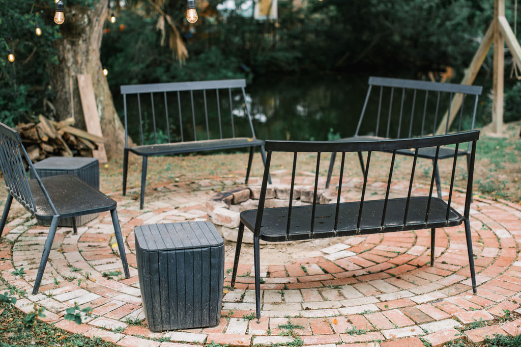 Communal fire pit for your enjoyment, nestled by the creek. 